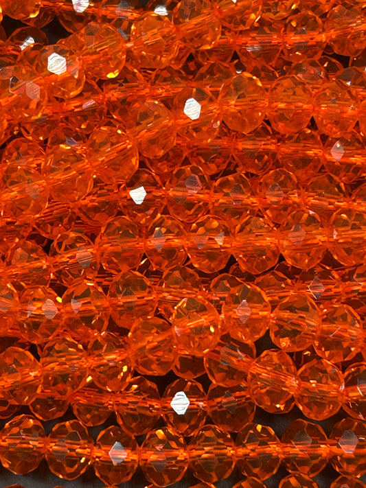 Beautiful Chinese crystal. Faceted Rondelle shape bead. Gorgeous orange iridescent rainbow color. Great quality glass full strand