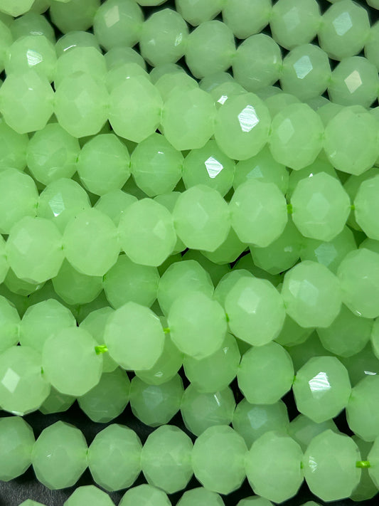 Beautiful Chinese crystal. Faceted Rondelle shape bead. Gorgeous spring green iridescent rainbow color. Great quality glass full strand