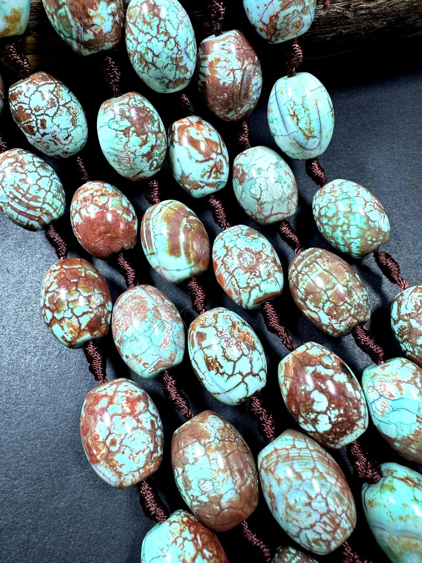 Natural Tibetan gemstone bead. barrel shape . gorgeous turquoise blue color with brown. excellent quality. full strand 15.5”