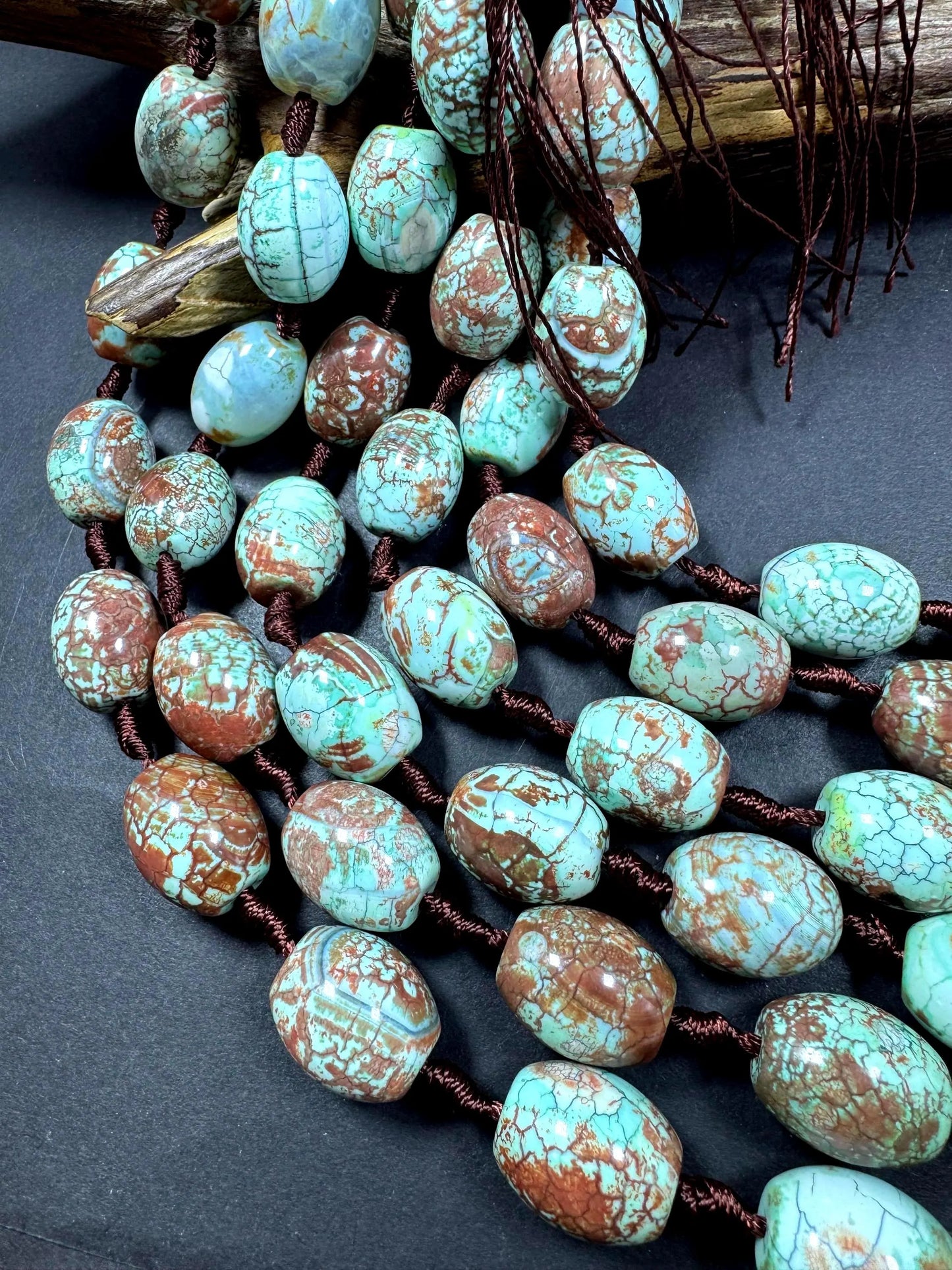 Natural Tibetan gemstone bead. barrel shape . gorgeous turquoise blue color with brown. excellent quality. full strand 15.5”