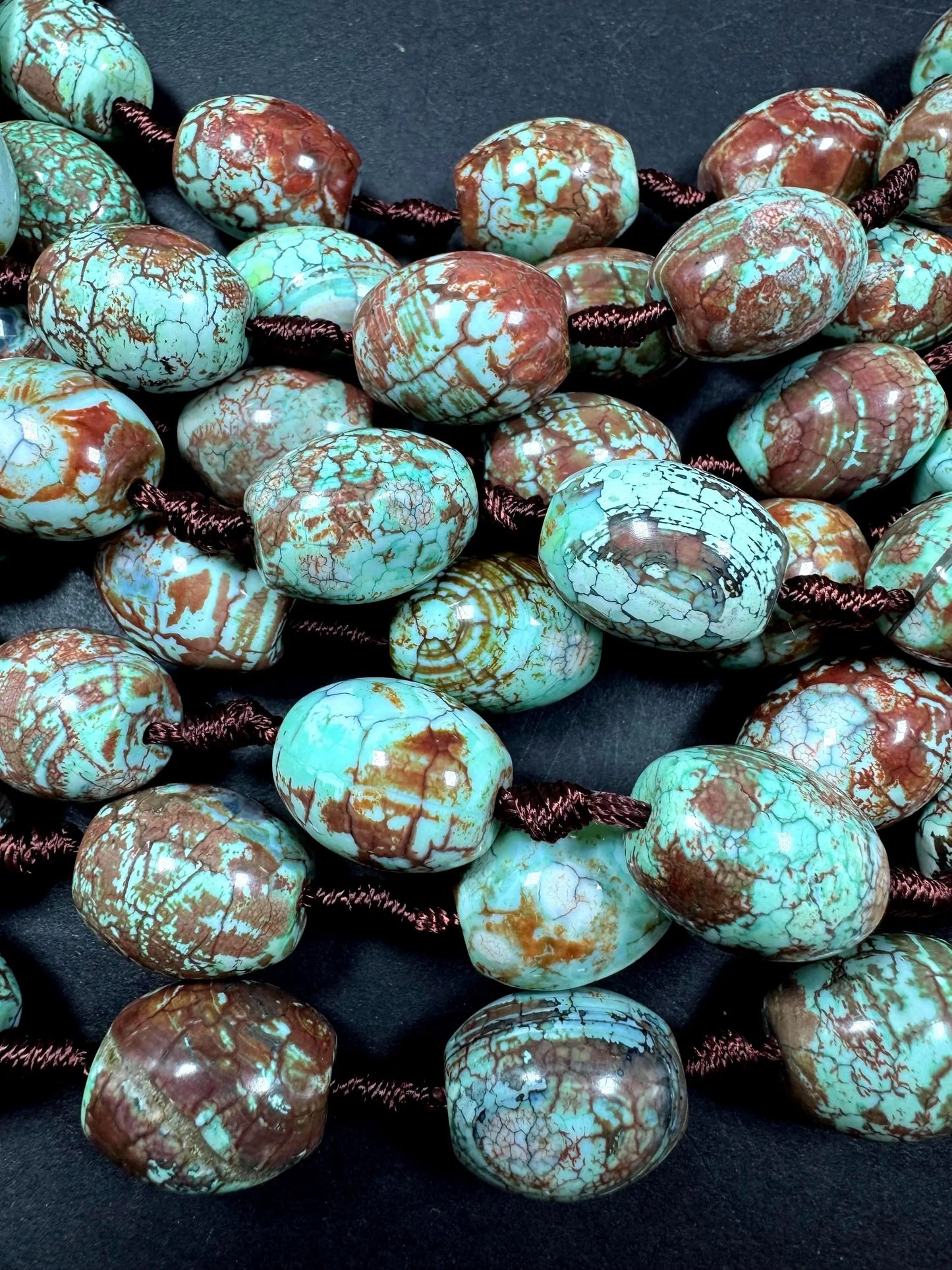 Natural Tibetan gemstone bead. barrel shape . gorgeous turquoise blue color with brown. excellent quality. full strand 15.5”