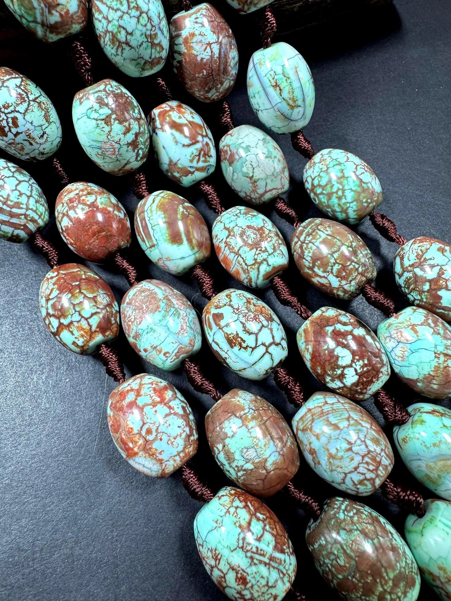 Natural Tibetan gemstone bead. barrel shape . gorgeous turquoise blue color with brown. excellent quality. full strand 15.5”