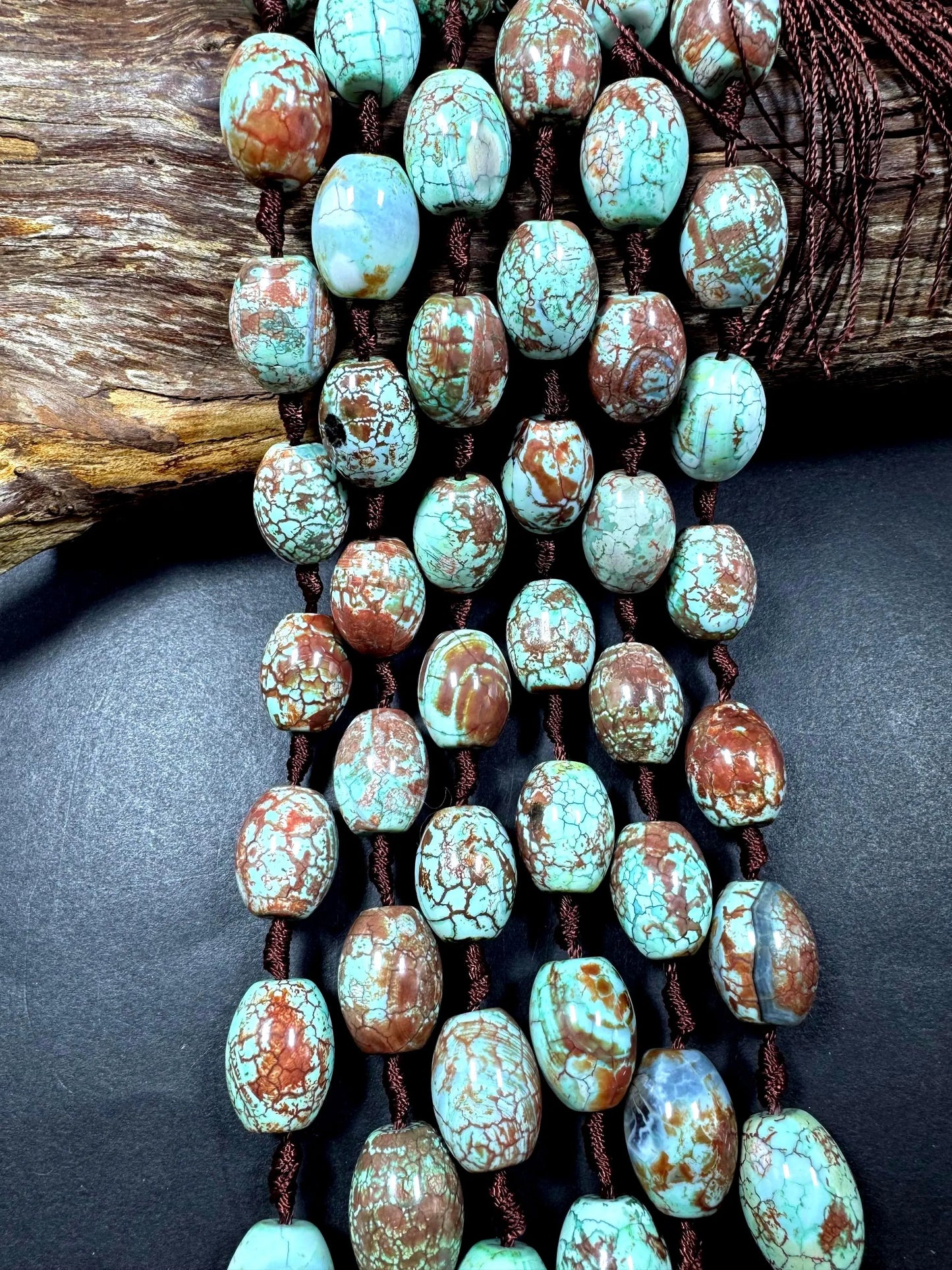 Natural Tibetan gemstone bead. barrel shape . gorgeous turquoise blue color with brown. excellent quality. full strand 15.5”