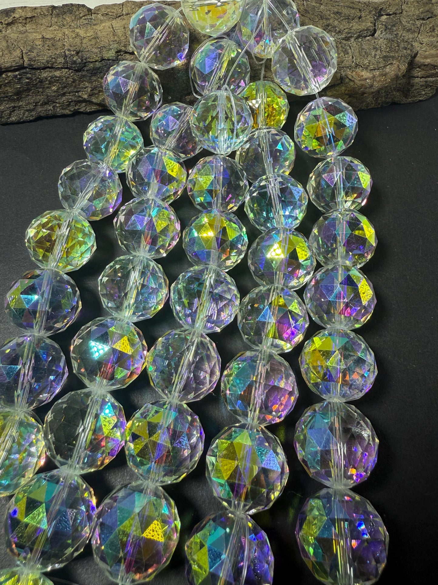 Beautiful Chinese crystal. AB (Aurora Borealis) coated faceted round crystal beads. Gorgeous clear with iridescent rainbow colors.