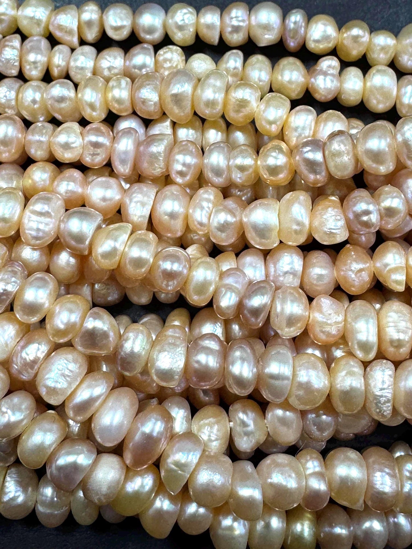 Natural fresh water pearls beads. Natural cream pink color . Excellent quality. Full strand.