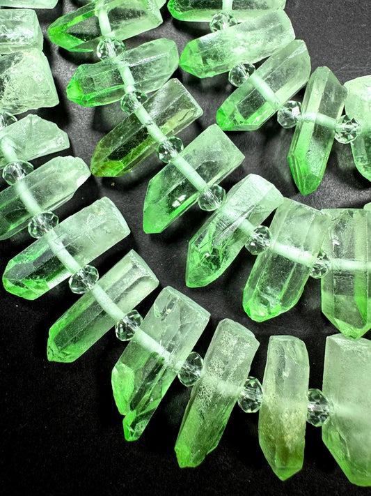 100% Natural Rock Crystal quartz . freedom teeth shape . Pear green color . full strand 15.5