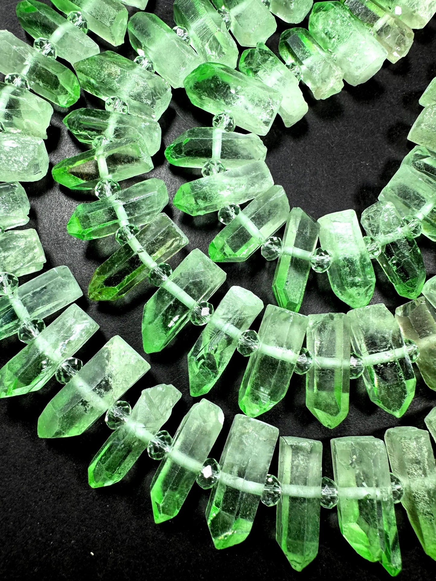 100% Natural Rock Crystal quartz . freedom teeth shape . Pear green color . full strand 15.5