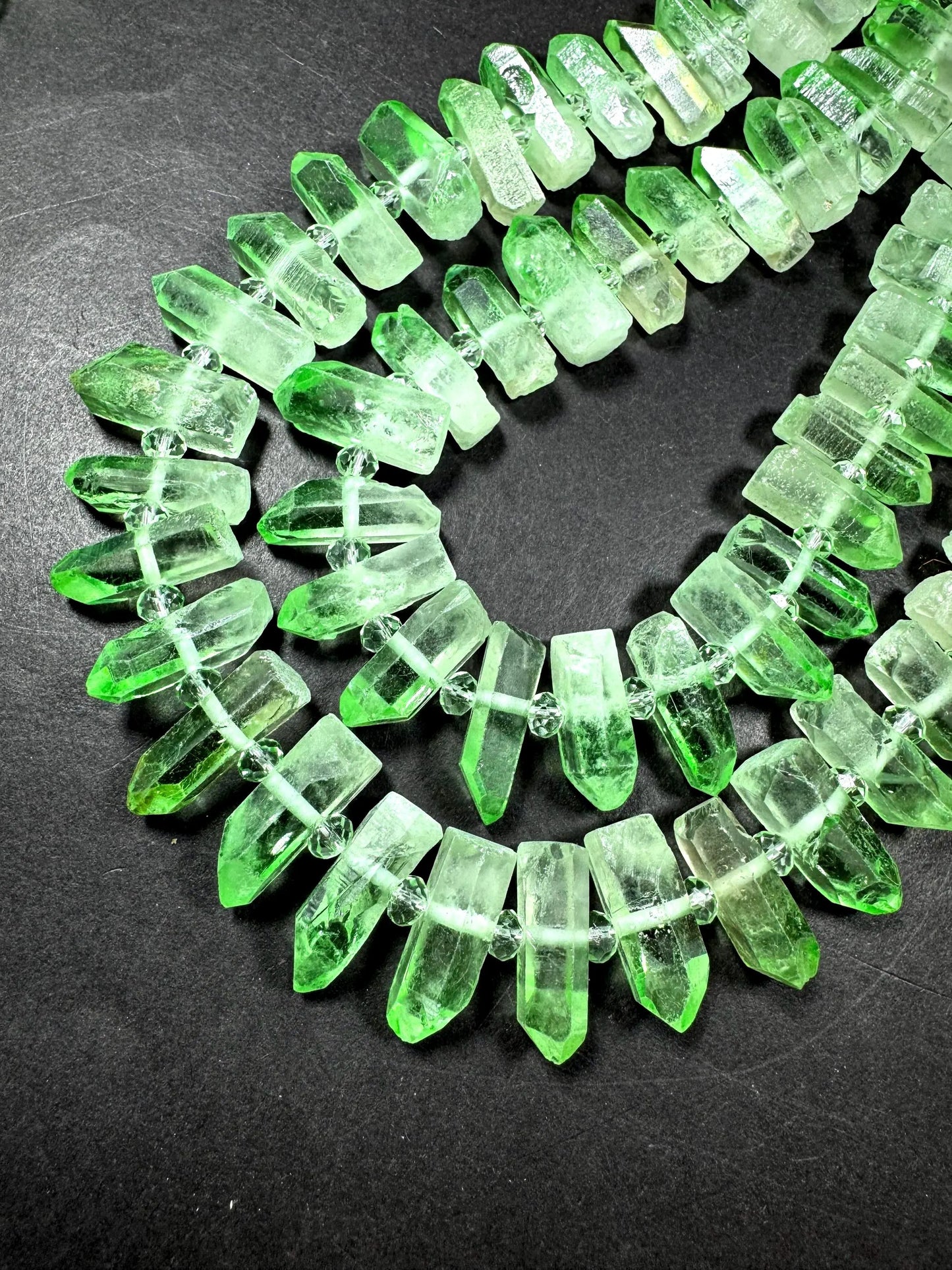100% Natural Rock Crystal quartz . freedom teeth shape . Pear green color . full strand 15.5