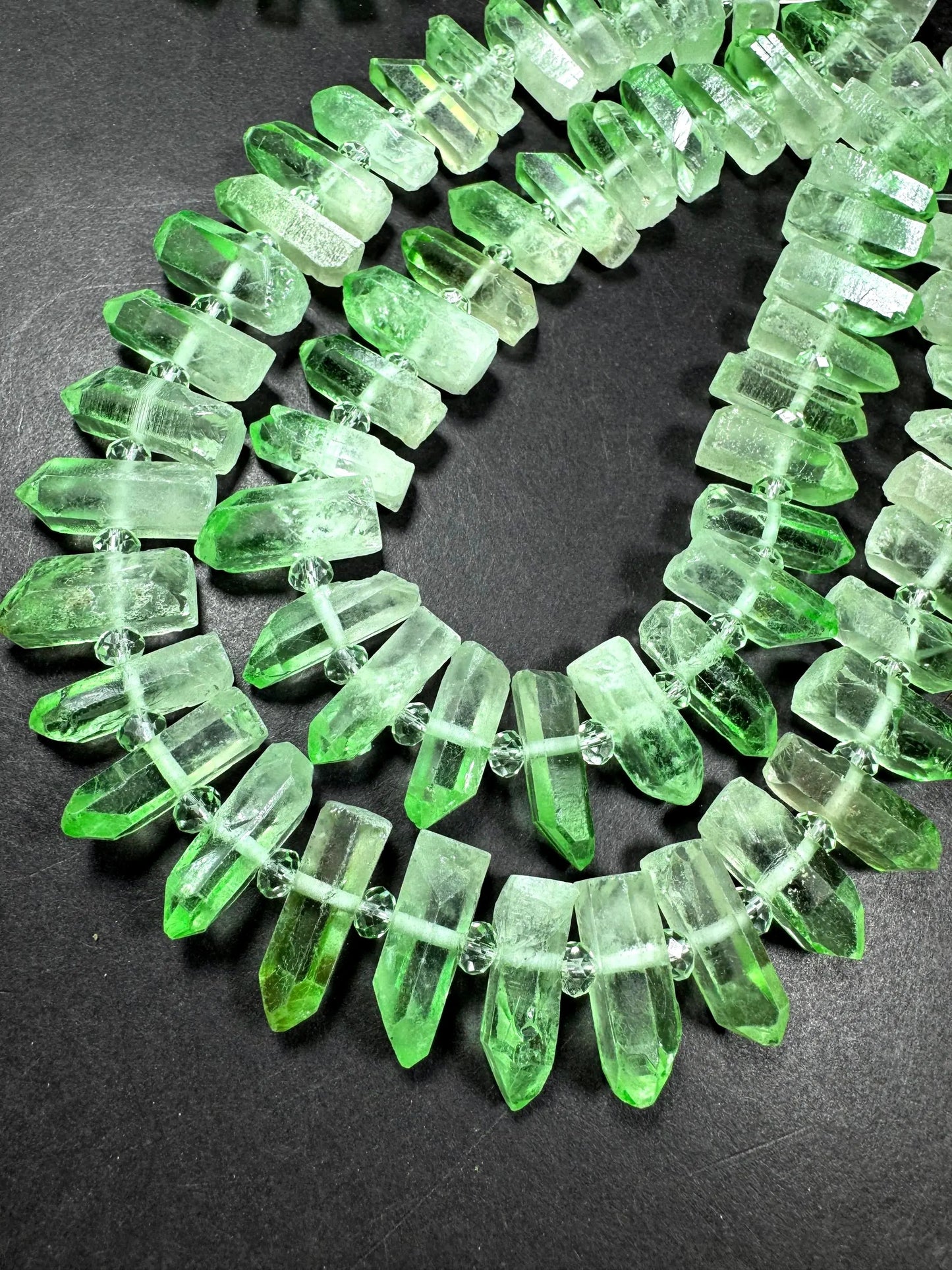 100% Natural Rock Crystal quartz . freedom teeth shape . Pear green color . full strand 15.5