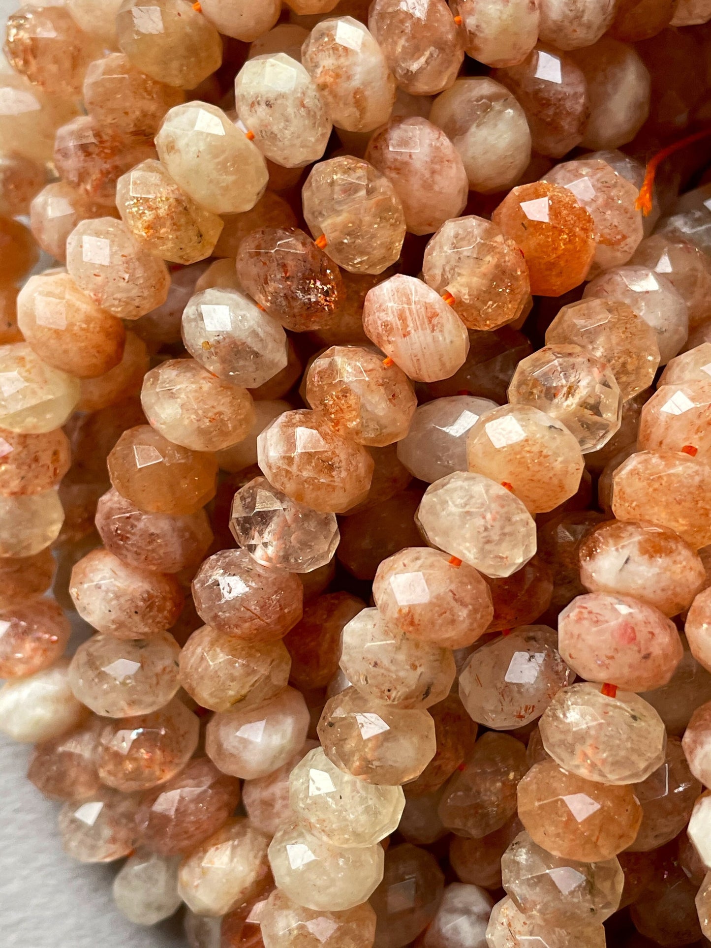 Natural fire sunstone bead. Faceted 5x7mm 6x10mm Rondelle bead. Gorgeous natural orange red fire color sunstone bead . Nice quality gemstone