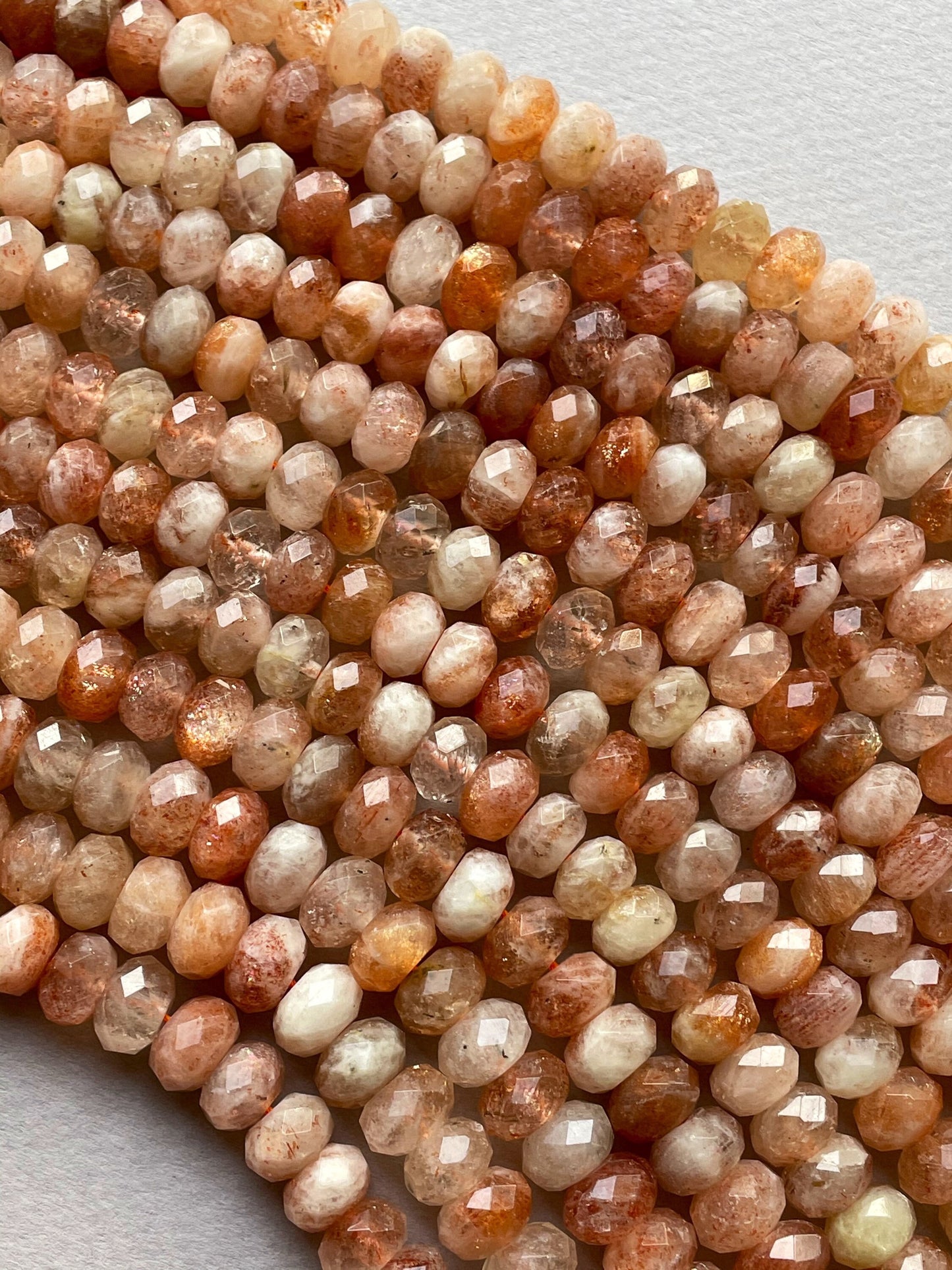 Natural fire sunstone bead. Faceted 5x7mm 6x10mm Rondelle bead. Gorgeous natural orange red fire color sunstone bead . Nice quality gemstone