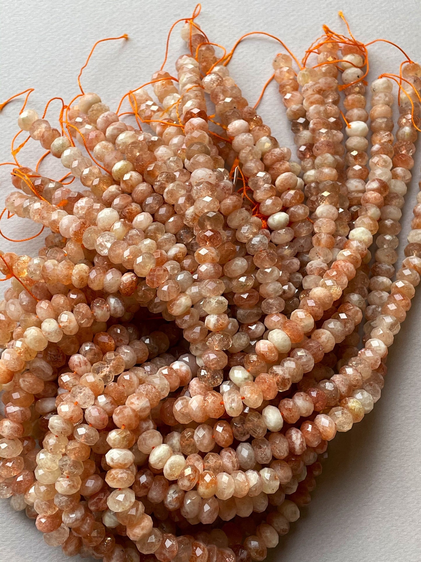Natural fire sunstone bead. Faceted 5x7mm 6x10mm Rondelle bead. Gorgeous natural orange red fire color sunstone bead . Nice quality gemstone