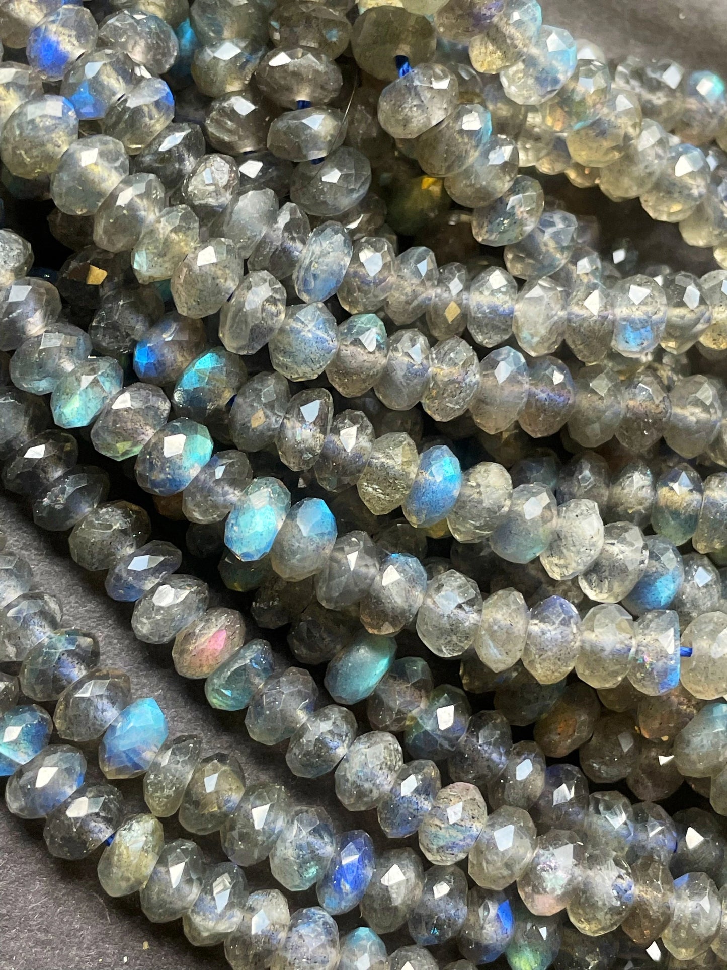 AA Natural blue flash labradorite stone bead . Faceted 3x4mm Rondelle Shape bead. Gorgeous gray color with beautiful blue flash full strand