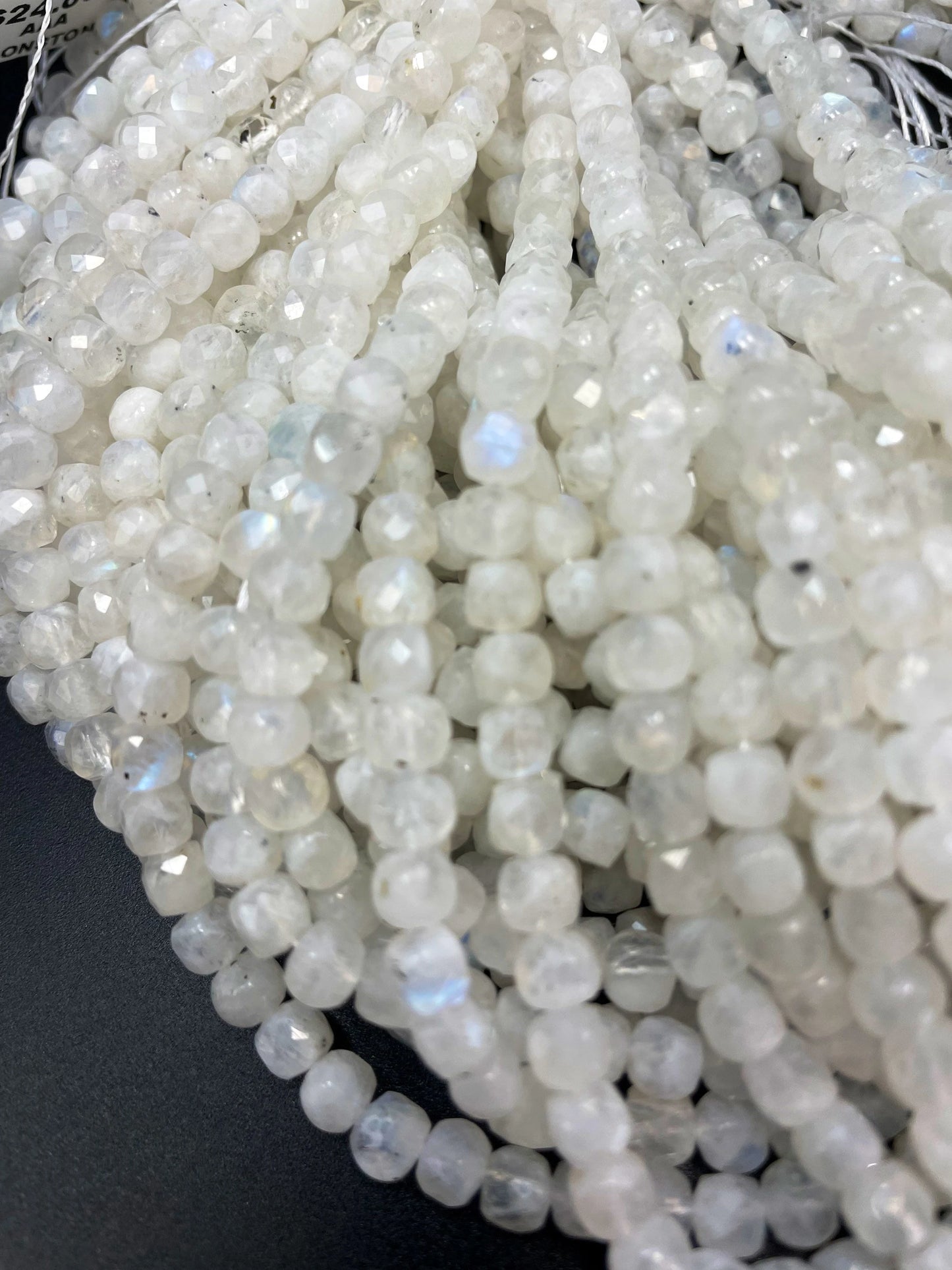 AA natural moonstone bead . Faceted 5mm cube shape bead. Beautiful natural white moonstone with blue flash on . High quality gemstone bead