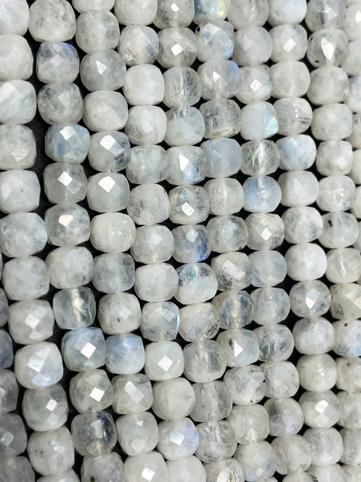 AA natural moonstone bead . Faceted 5mm cube shape bead. Beautiful natural white moonstone with blue flash on . High quality gemstone bead