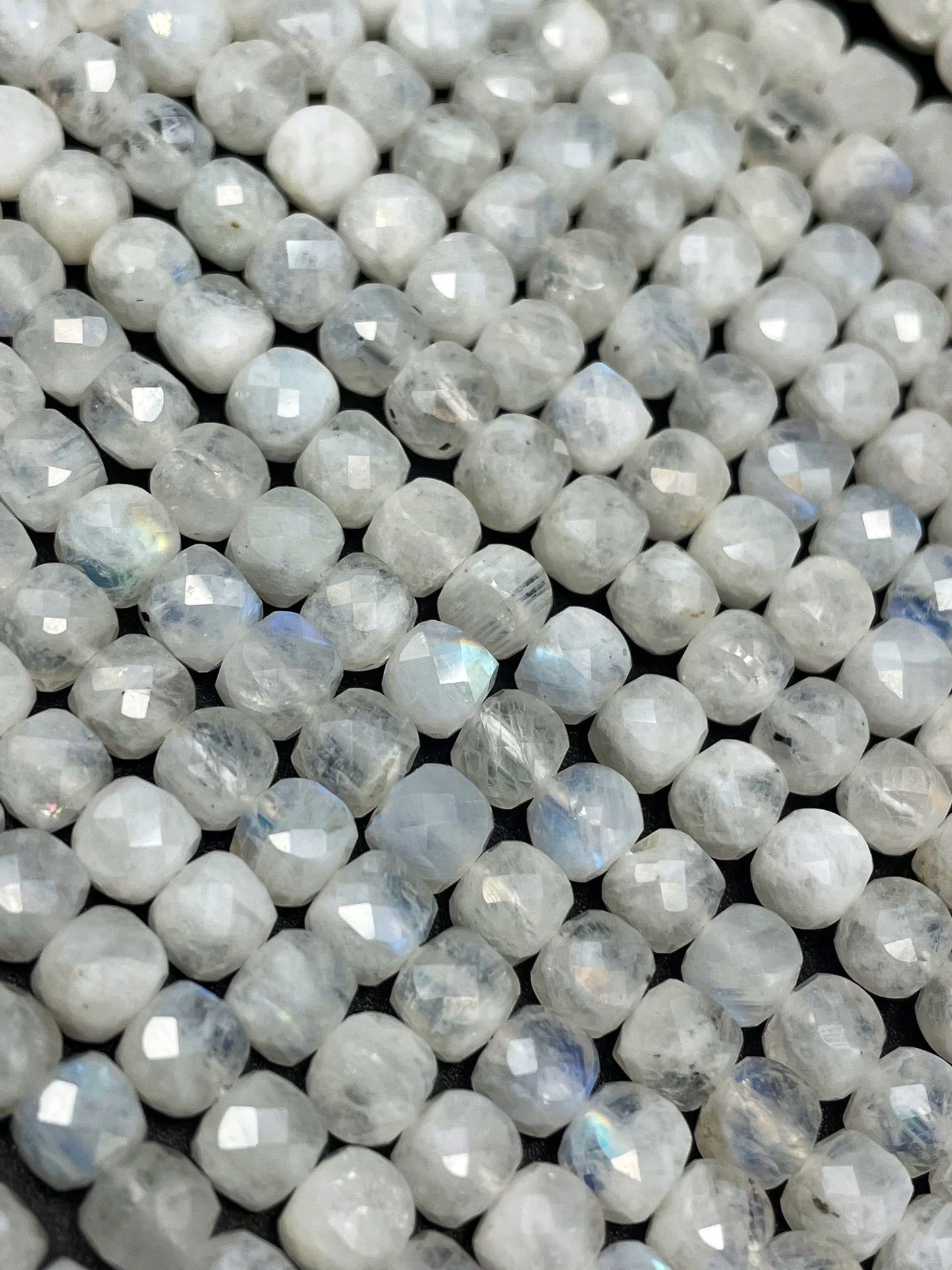 AA natural moonstone bead . Faceted 5mm cube shape bead. Beautiful natural white moonstone with blue flash on . High quality gemstone bead