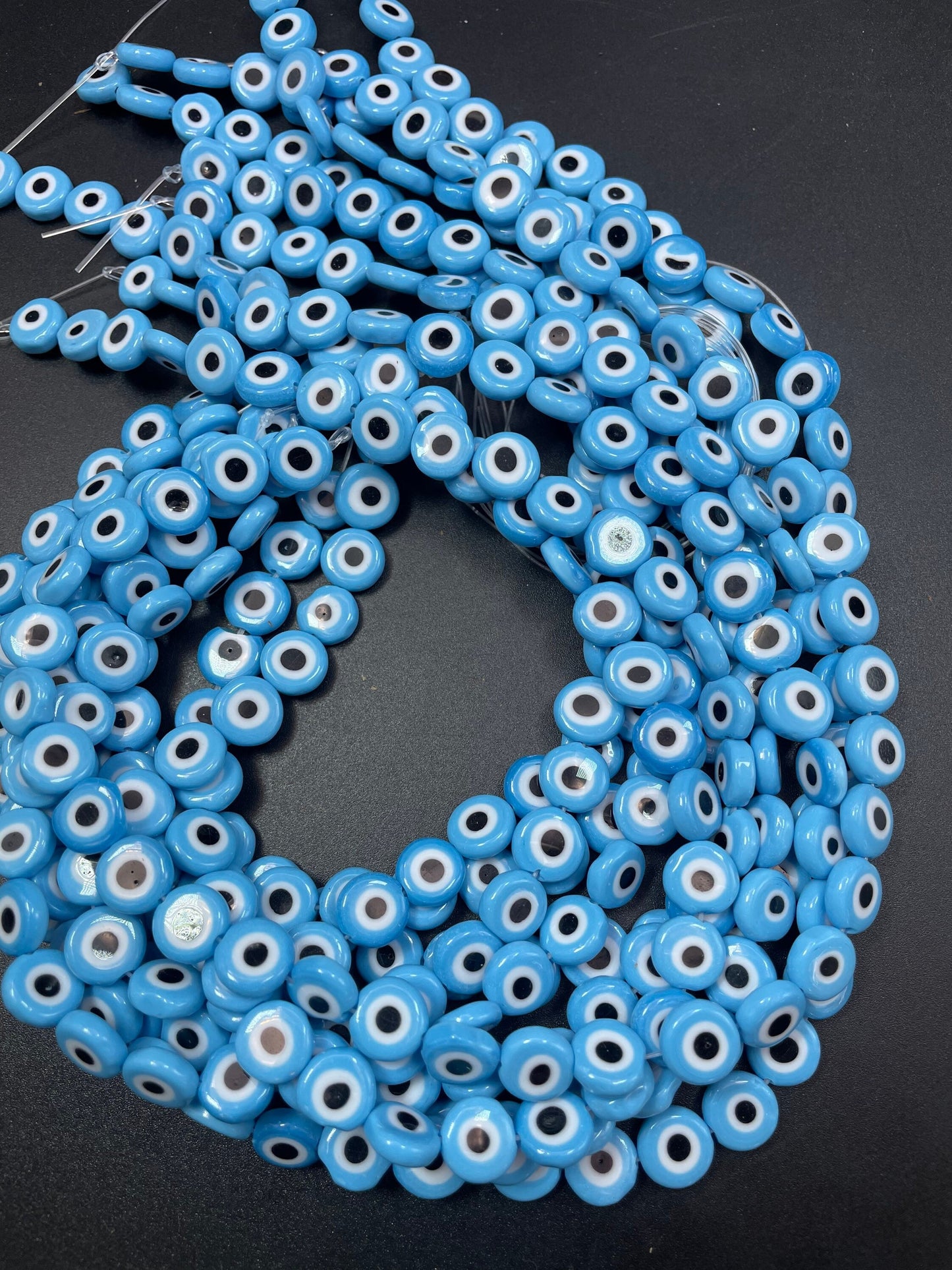 Beautiful Evil eye glass crystal beads . Religious amulet prayer beads . 10mm flat Coin shape Beautiful blue black color. Lucky eye