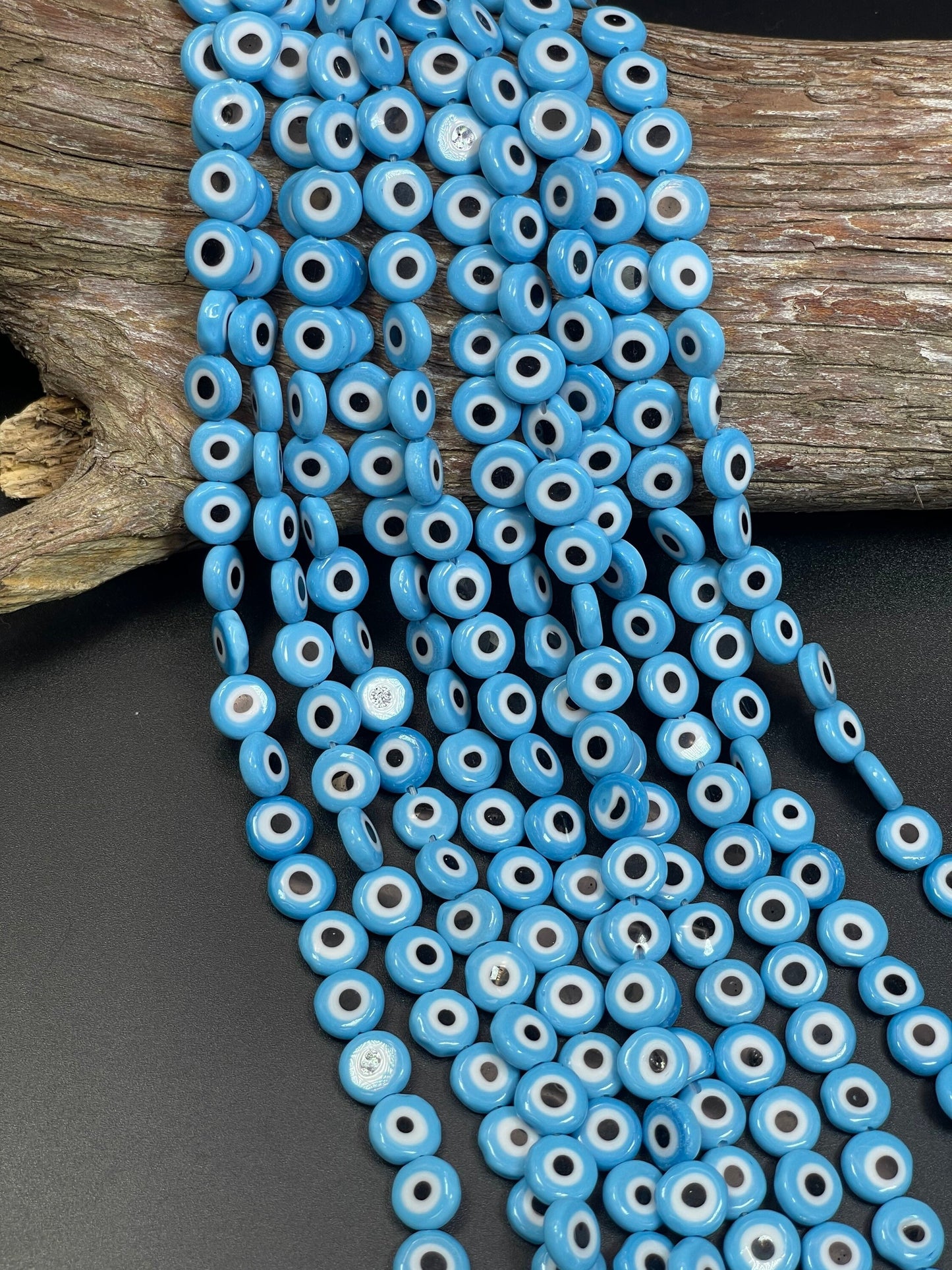 Beautiful Evil eye glass crystal beads . Religious amulet prayer beads . 10mm flat Coin shape Beautiful blue black color. Lucky eye