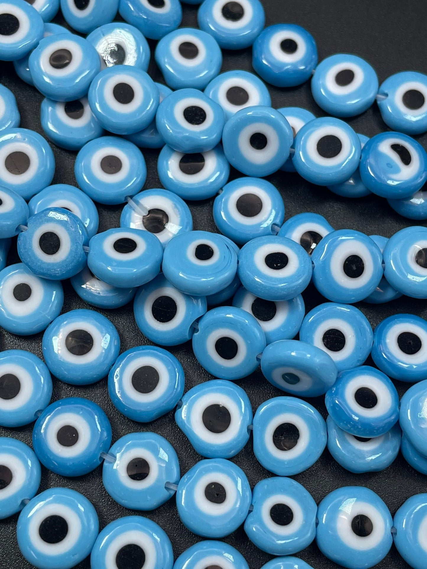 Beautiful Evil eye glass crystal beads . Religious amulet prayer beads . 10mm flat Coin shape Beautiful blue black color. Lucky eye
