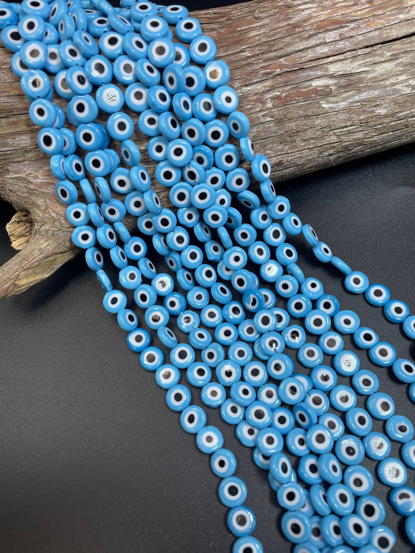 Beautiful Evil eye glass crystal beads . Religious amulet prayer beads . 10mm flat Coin shape Beautiful blue black color. Lucky eye
