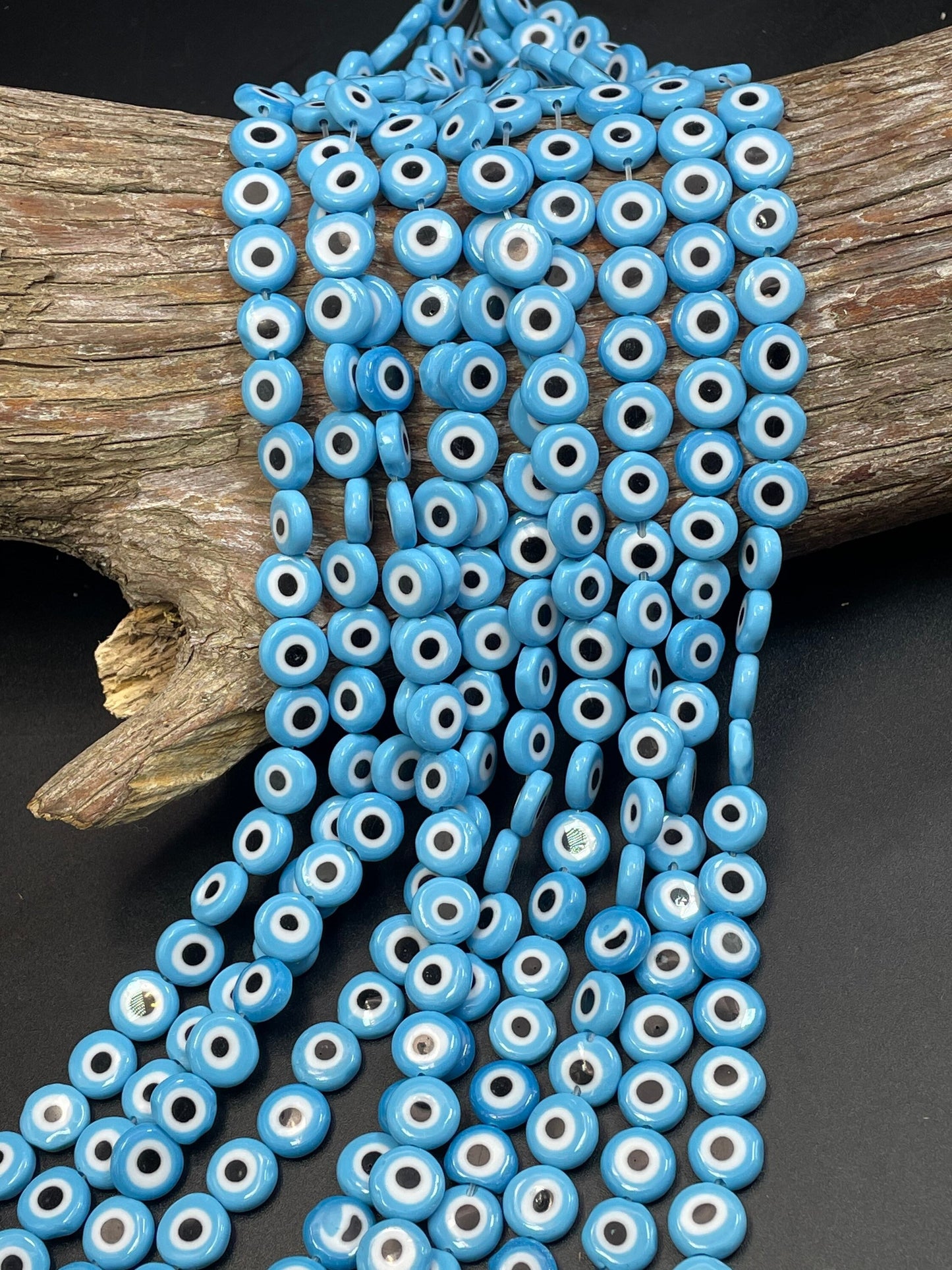 Beautiful Evil eye glass crystal beads . Religious amulet prayer beads . 10mm flat Coin shape Beautiful blue black color. Lucky eye
