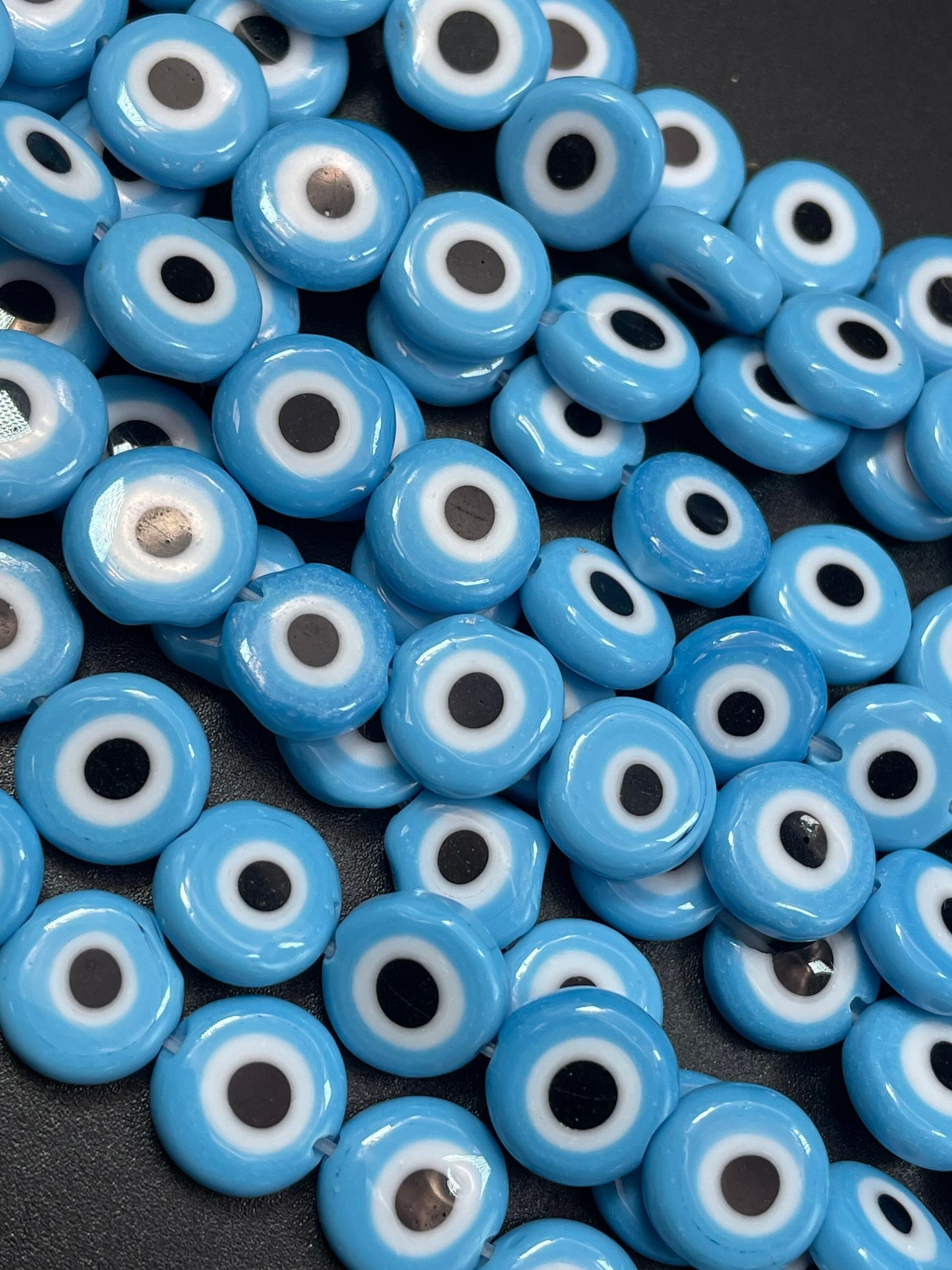 Beautiful Evil eye glass crystal beads . Religious amulet prayer beads . 10mm flat Coin shape Beautiful blue black color. Lucky eye