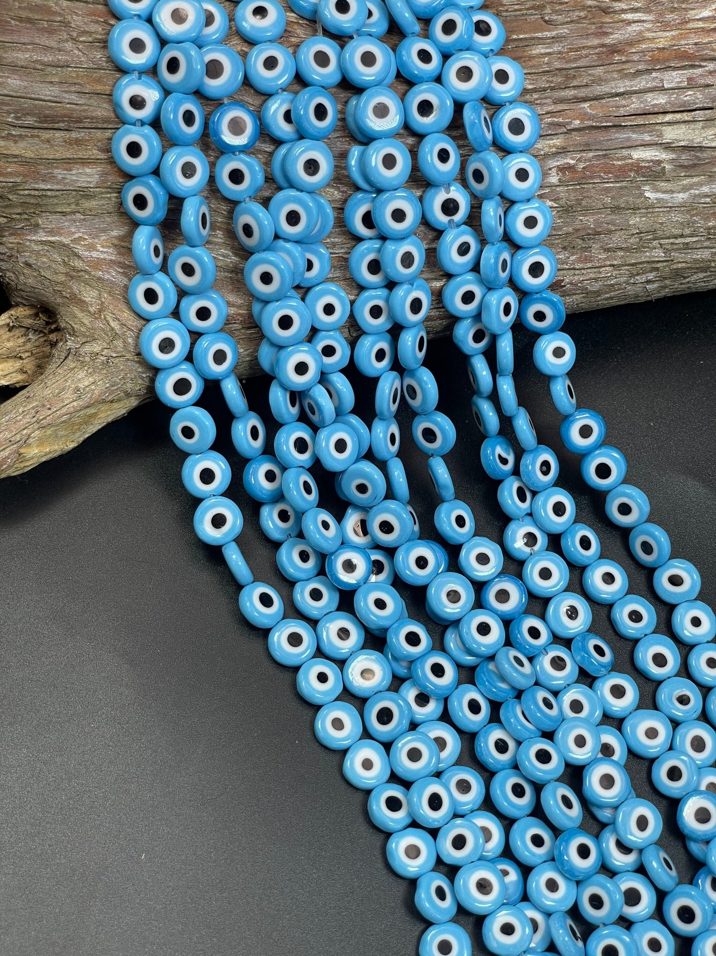 Beautiful Evil eye glass crystal beads . Religious amulet prayer beads . 10mm flat Coin shape Beautiful blue black color. Lucky eye