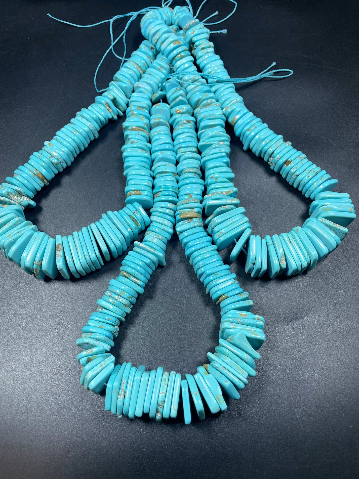 Natural blue turquoise gemstone bead . Graduated shape. Beautiful turquoise blue color. Nice polished turquoise howlite gemstone bead!