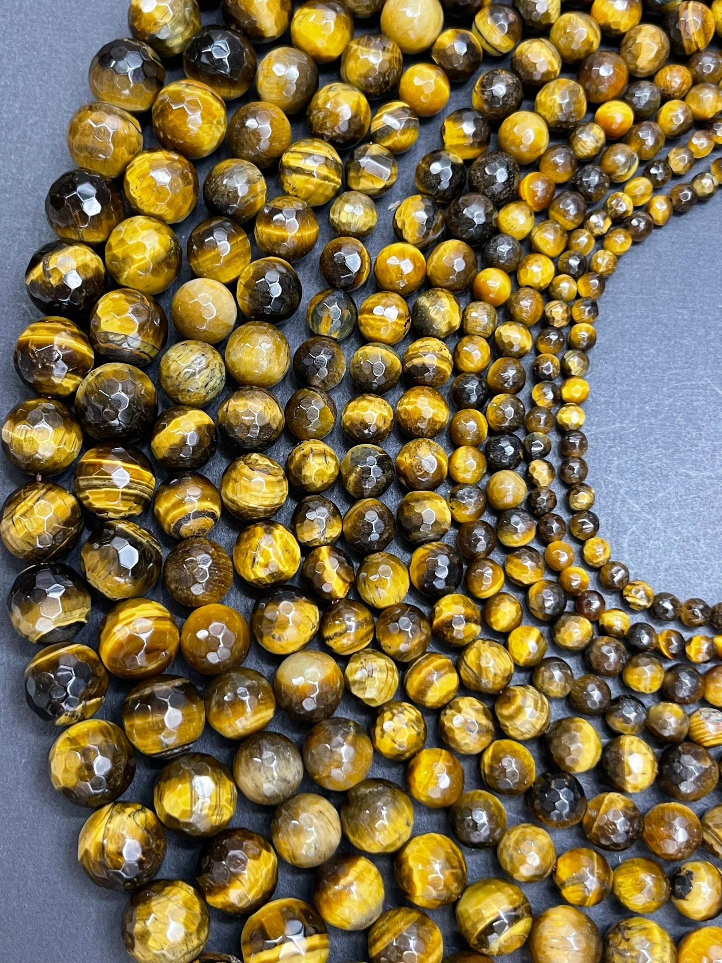 AAA Natural Faceted Tiger Eye Stone Bead. 4mm-12mm round bead. Gorgeous golden brown color tiger eye. Great quality gemstone. 15.5”
