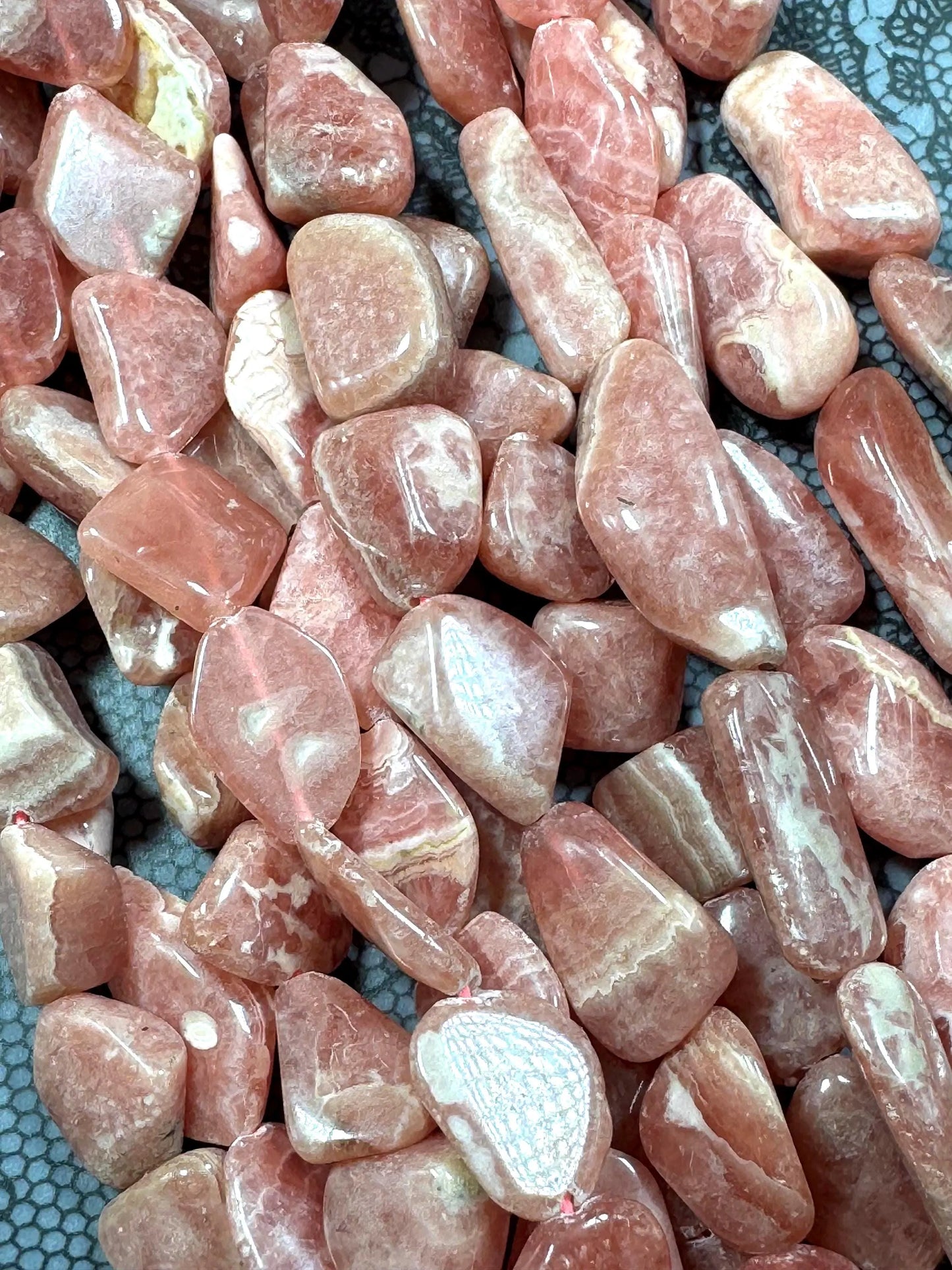 AA natural rhodochrosite stone bead. Gorgeous natural freedom nugget shape. natural pink color rhodochrosite expands quality full strand