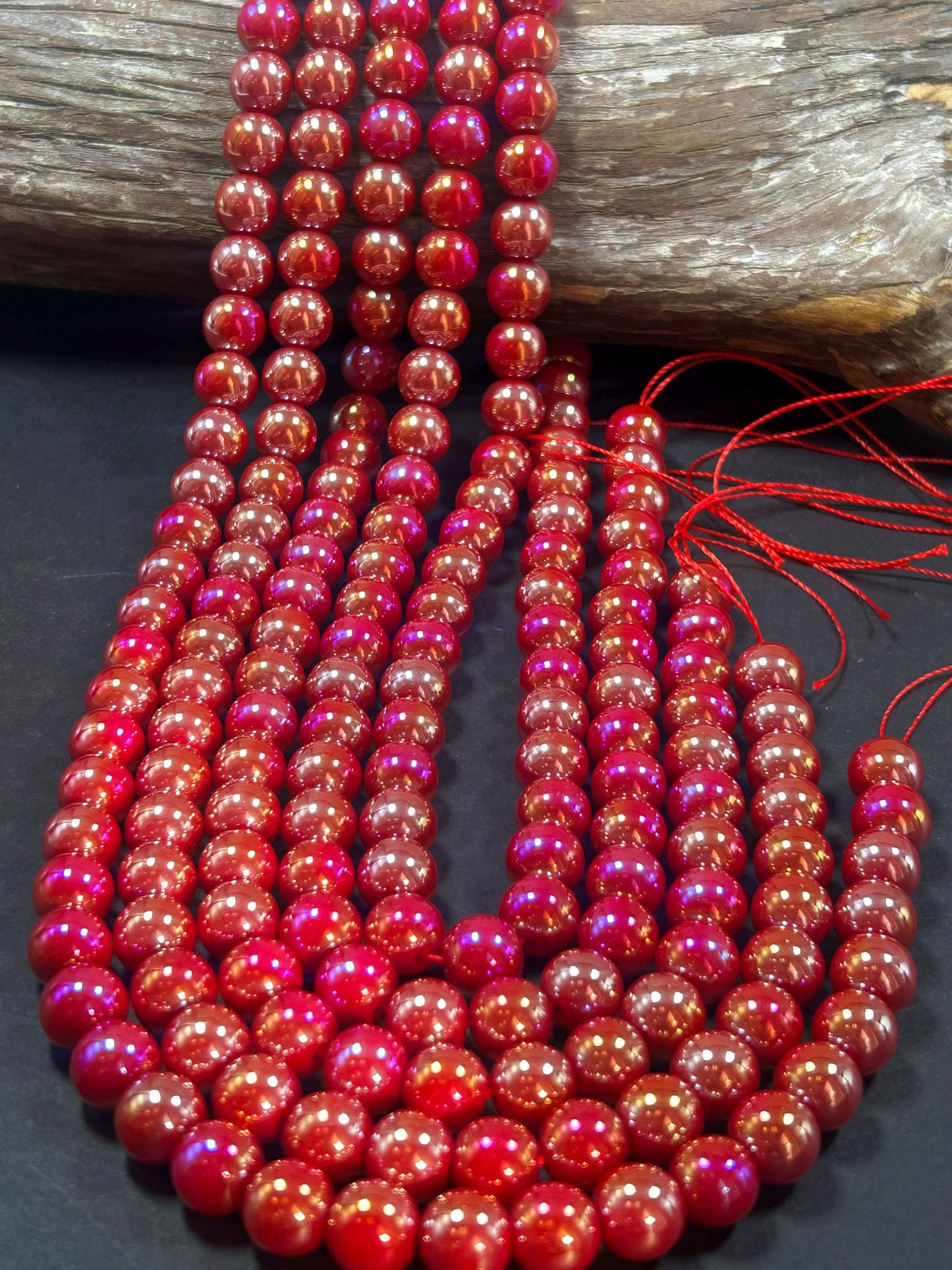 Beautiful Chinese crystal. Smooth Round shape bead. Gorgeous red with iridescent rainbow colors, great quality crystal full strand
