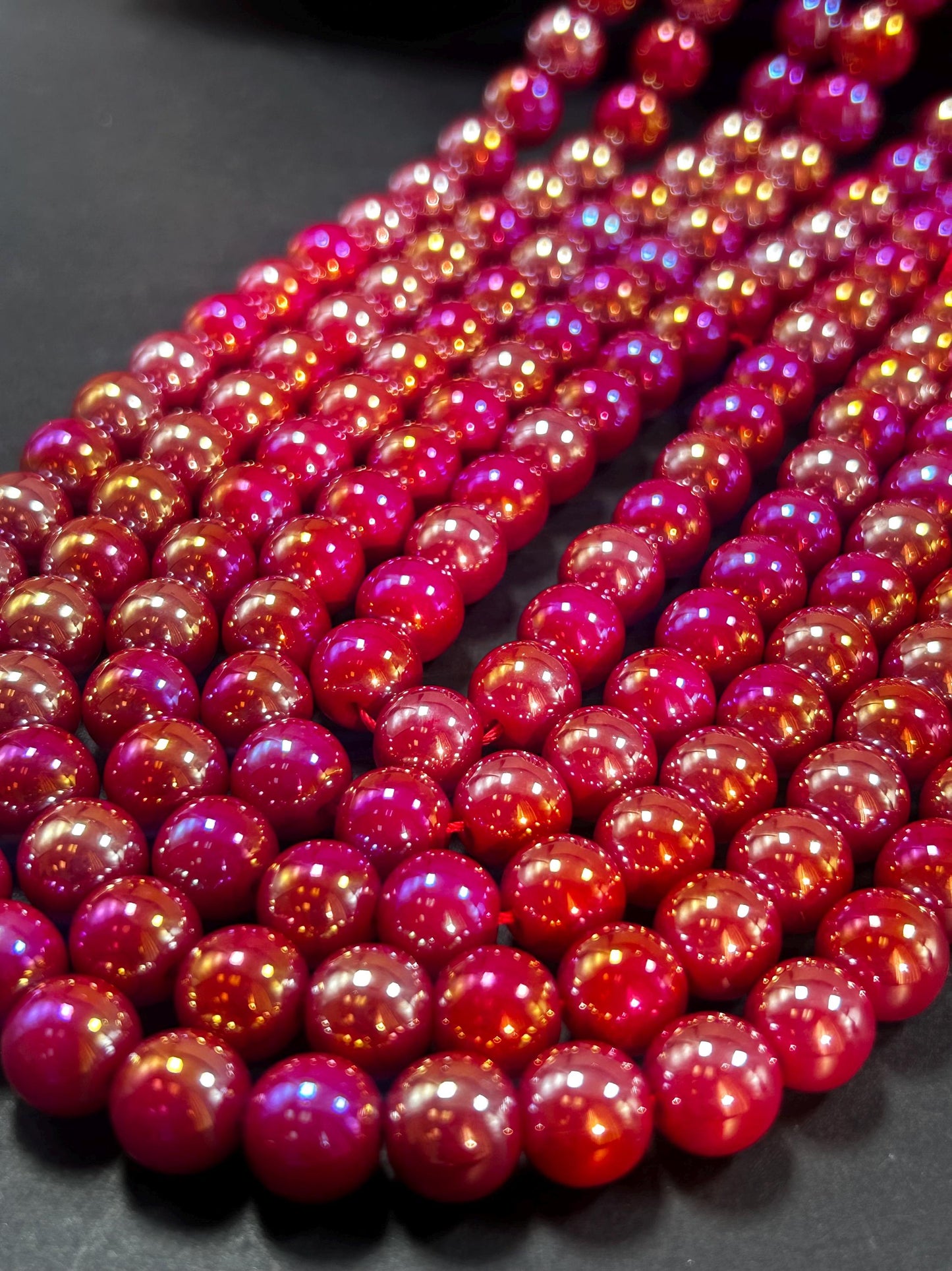 Beautiful Chinese crystal. Smooth Round shape bead. Gorgeous red with iridescent rainbow colors, great quality crystal full strand