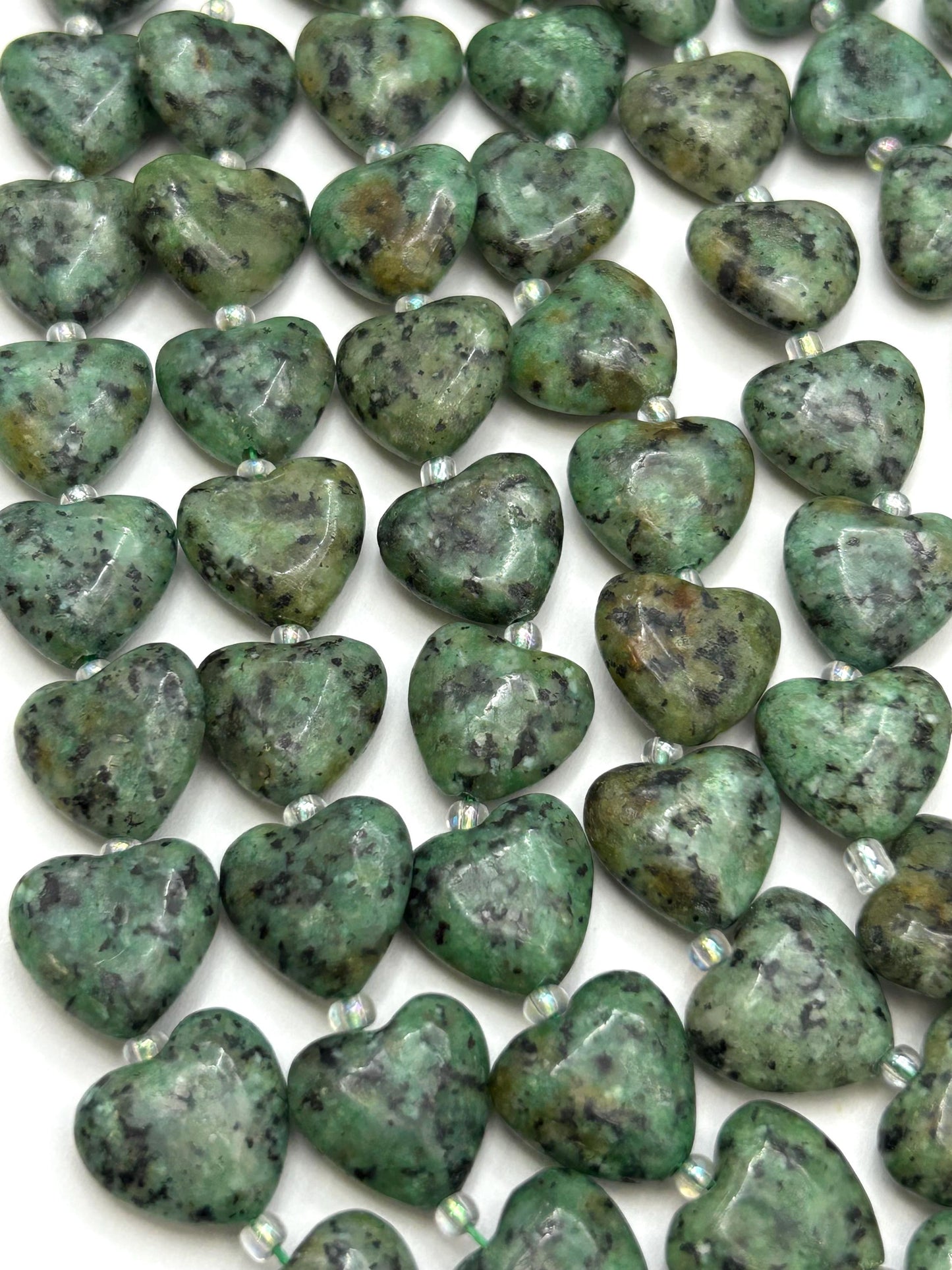 Natural Africa turquoise stone bead . 14mm heart shape bead. Gorgeous green black natural color African turquoise bead. 15.5”