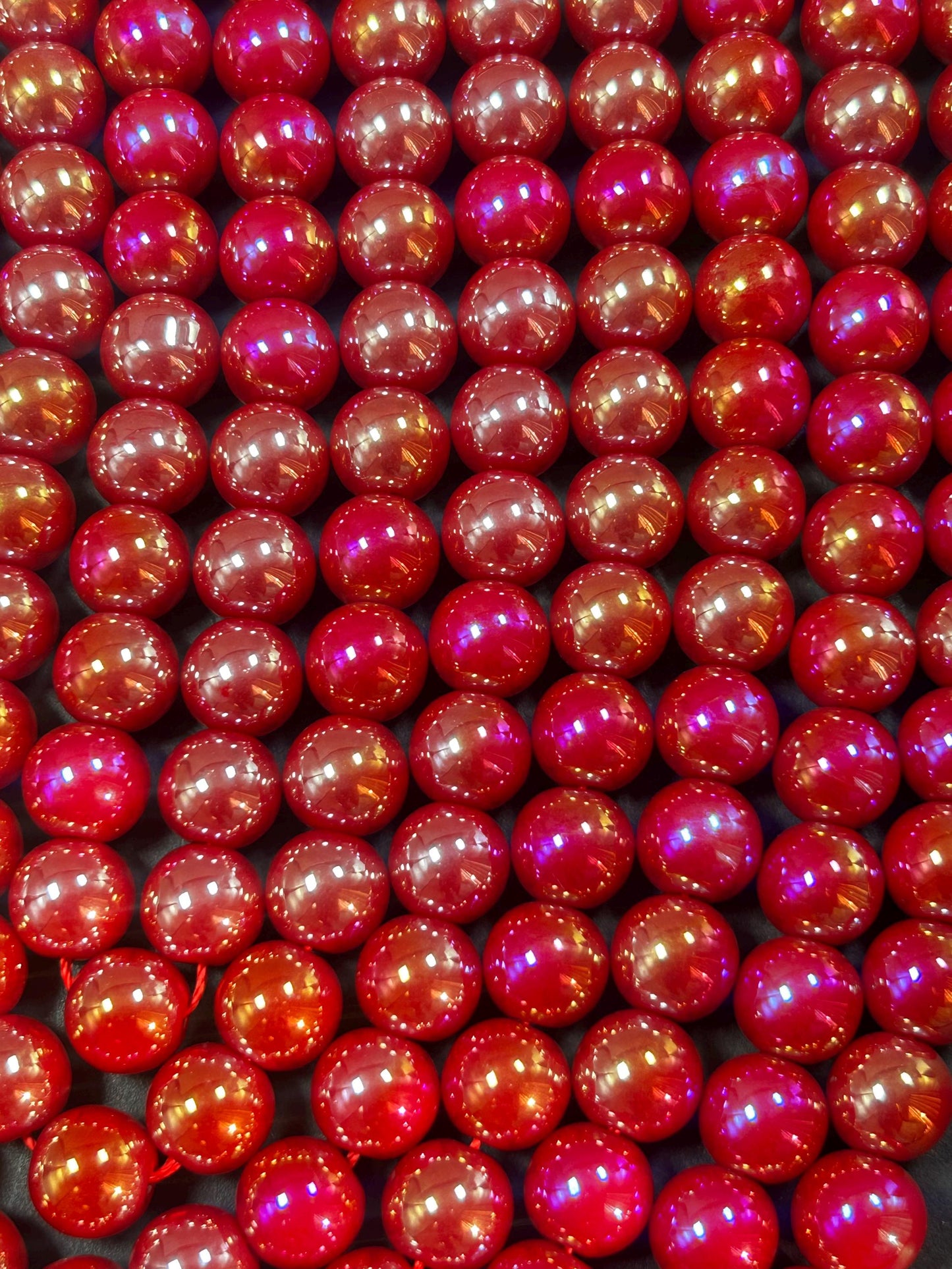 Beautiful Chinese crystal. Smooth Round shape bead. Gorgeous red with iridescent rainbow colors, great quality crystal full strand