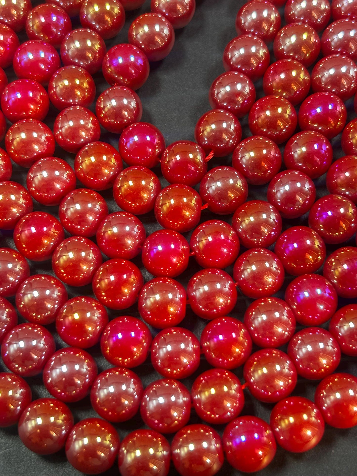 Beautiful Chinese crystal. Smooth Round shape bead. Gorgeous red with iridescent rainbow colors, great quality crystal full strand