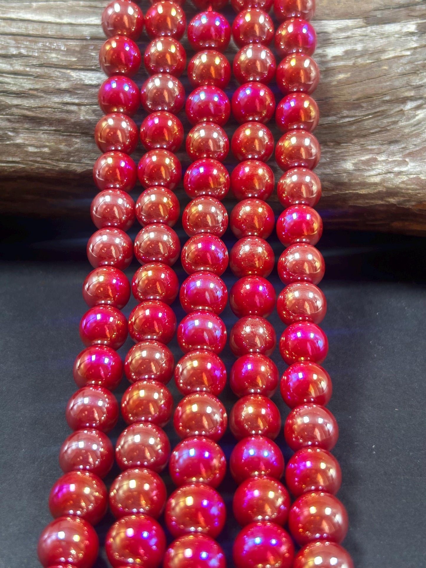 Beautiful Chinese crystal. Smooth Round shape bead. Gorgeous red with iridescent rainbow colors, great quality crystal full strand