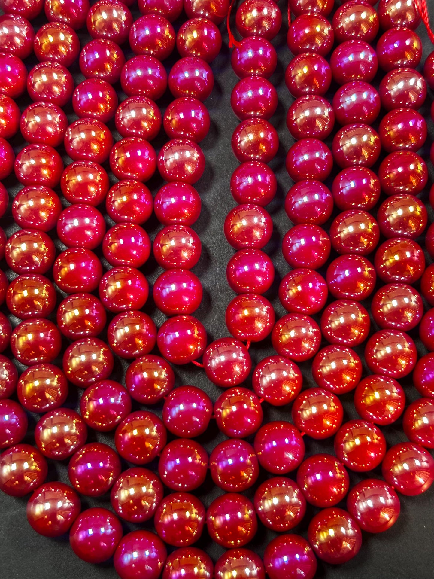 Beautiful Chinese crystal. Smooth Round shape bead. Gorgeous red with iridescent rainbow colors, great quality crystal full strand