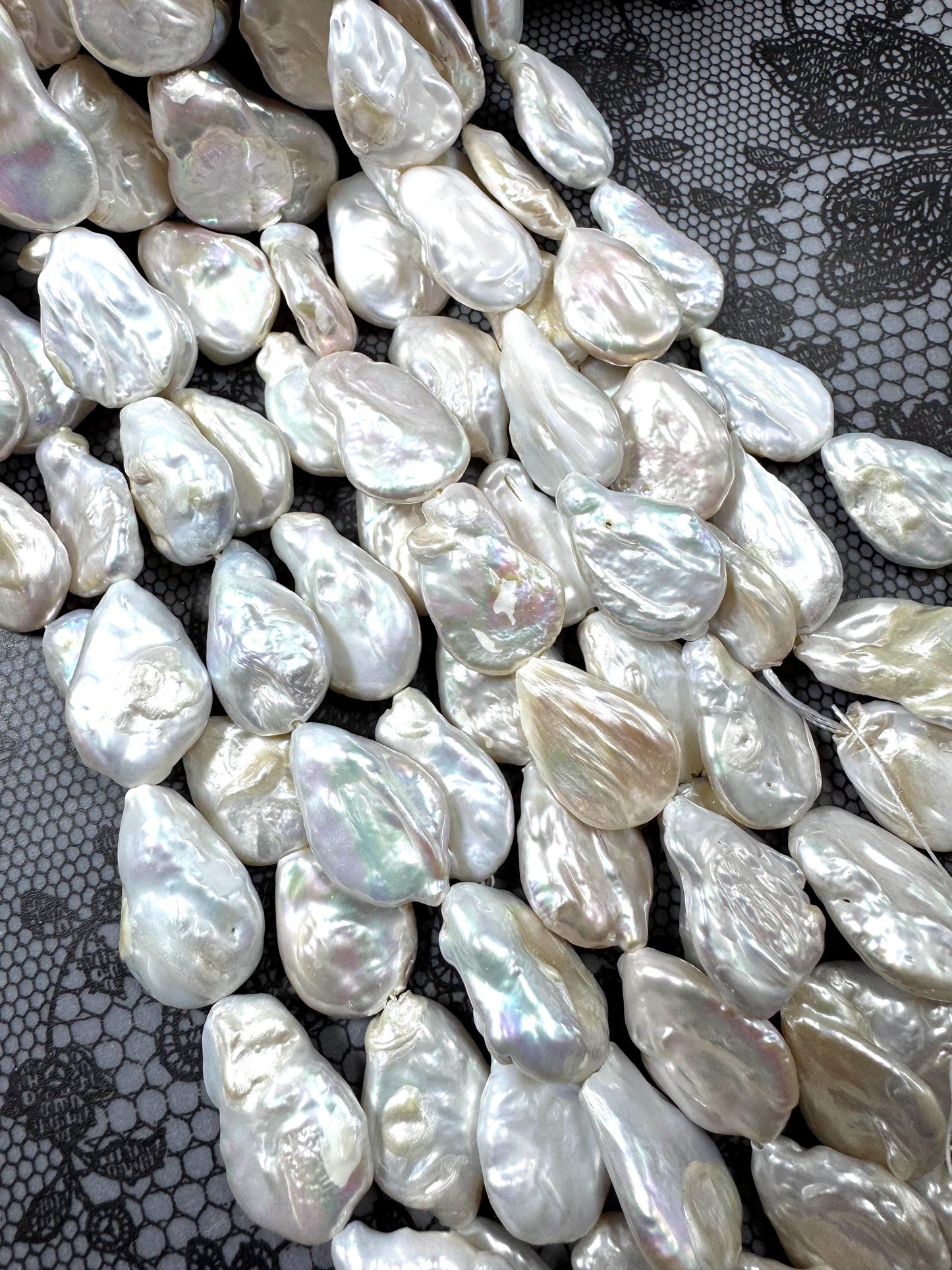 Natural fresh water pearls bead. teardrop shape . beautiful Natural white color pearls beads . nice quality . full strand .