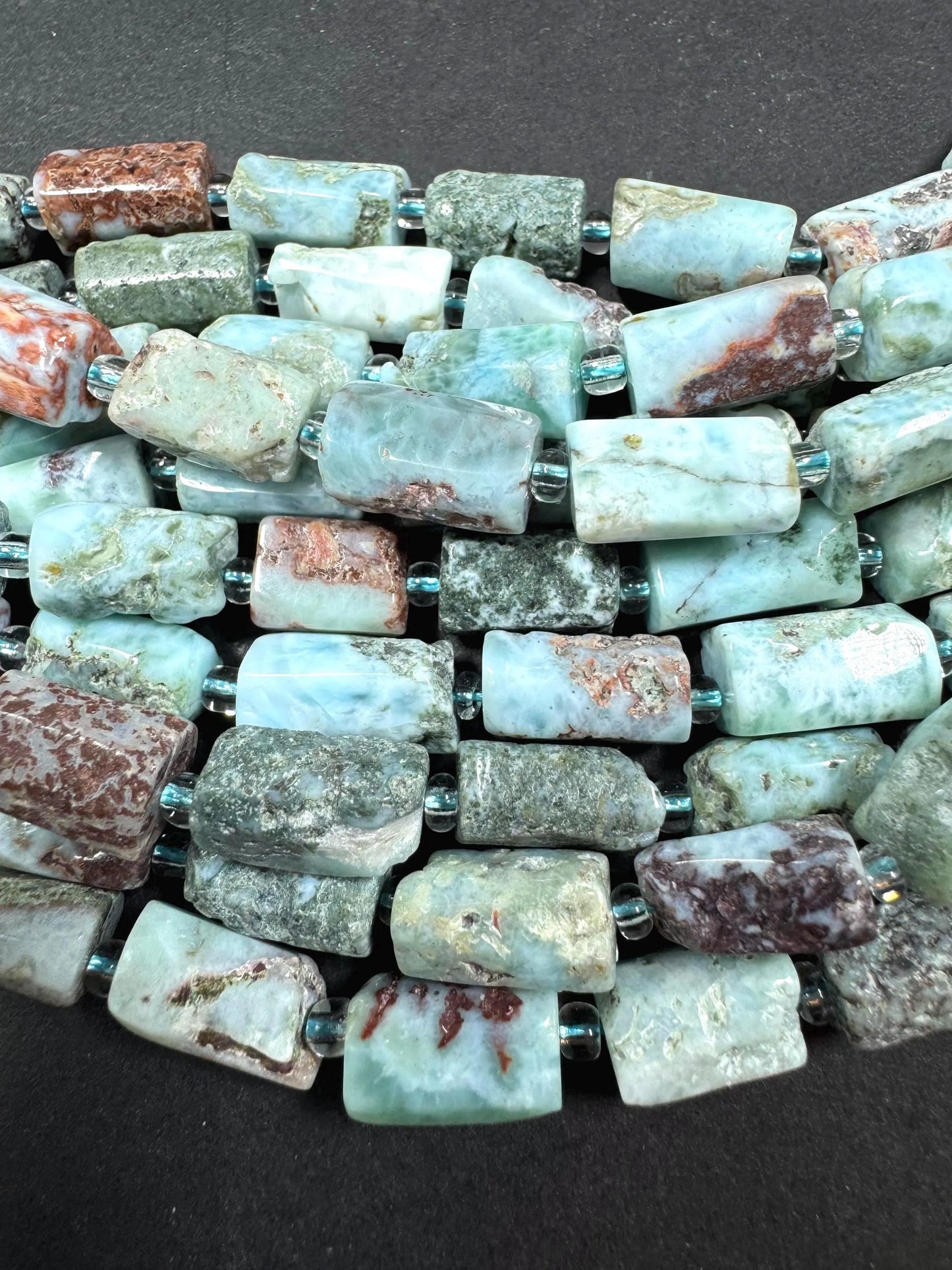 Natural blue Larimar gemstone bead. 8x12mm tube shape .beautiful Natural color. Excellent quality . full strand 15.5”