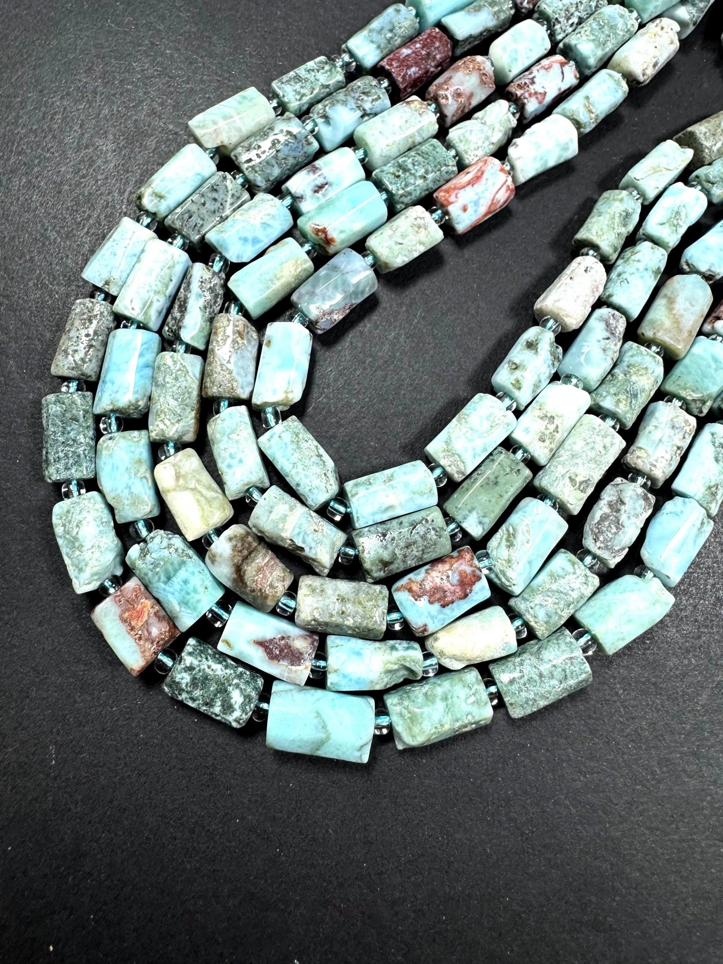Natural blue Larimar gemstone bead. 8x12mm tube shape .beautiful Natural color. Excellent quality . full strand 15.5”
