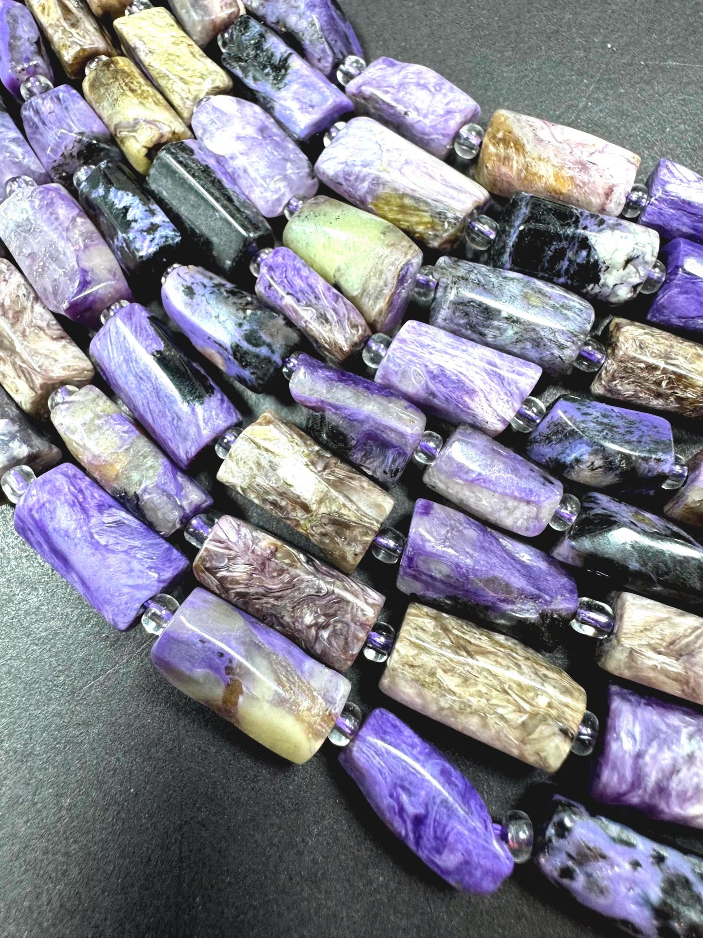 AA Natural Charoite gemstone bead. 8x12mm tube shape .beautiful Natural color. Excellent quality . full strand 15.5