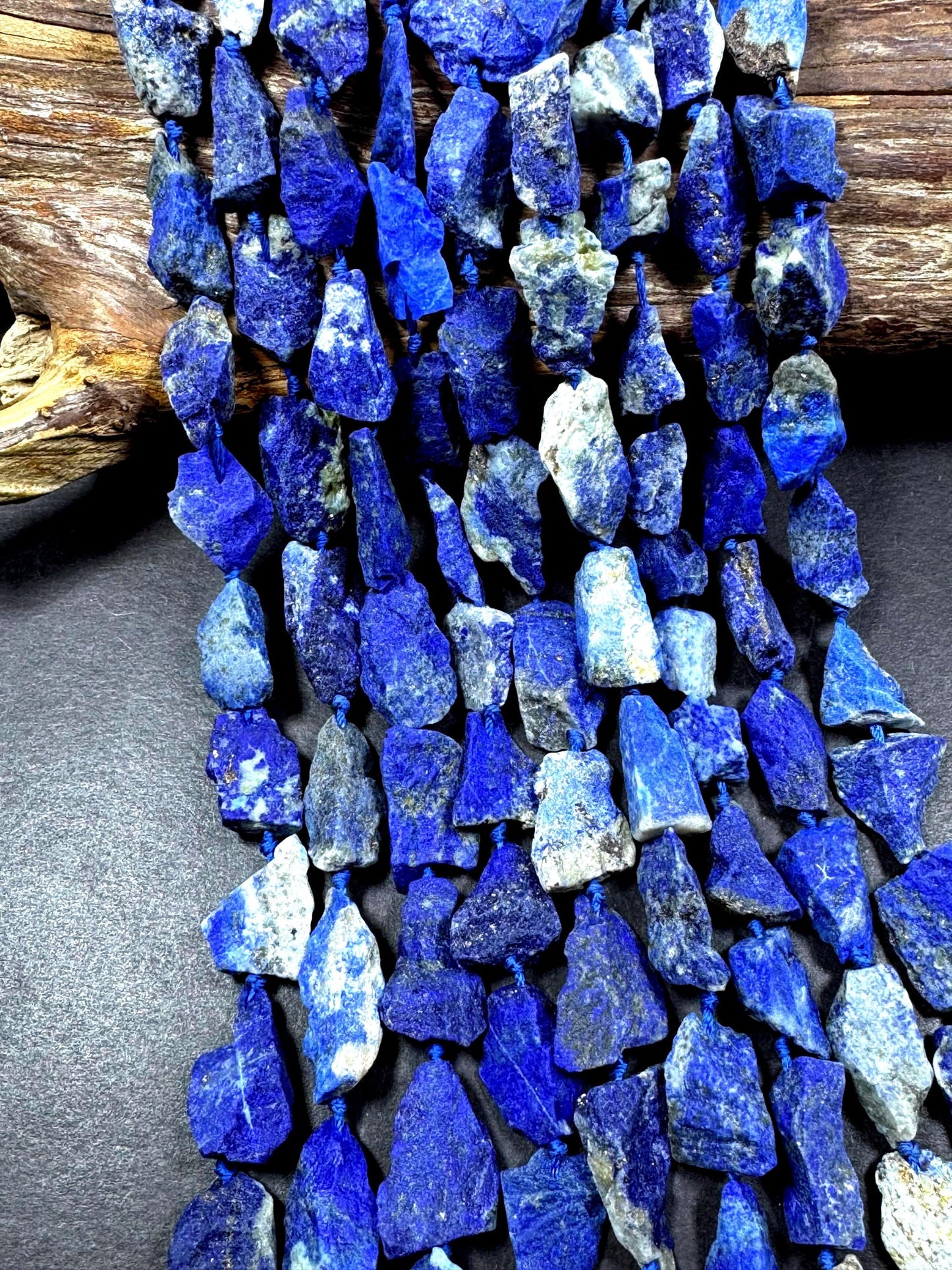 Natural raw lapis gemstone bead. freedom nugget shape . gorgeous Natural royal blue color . Not treated. excellent quality. full strand 15.5