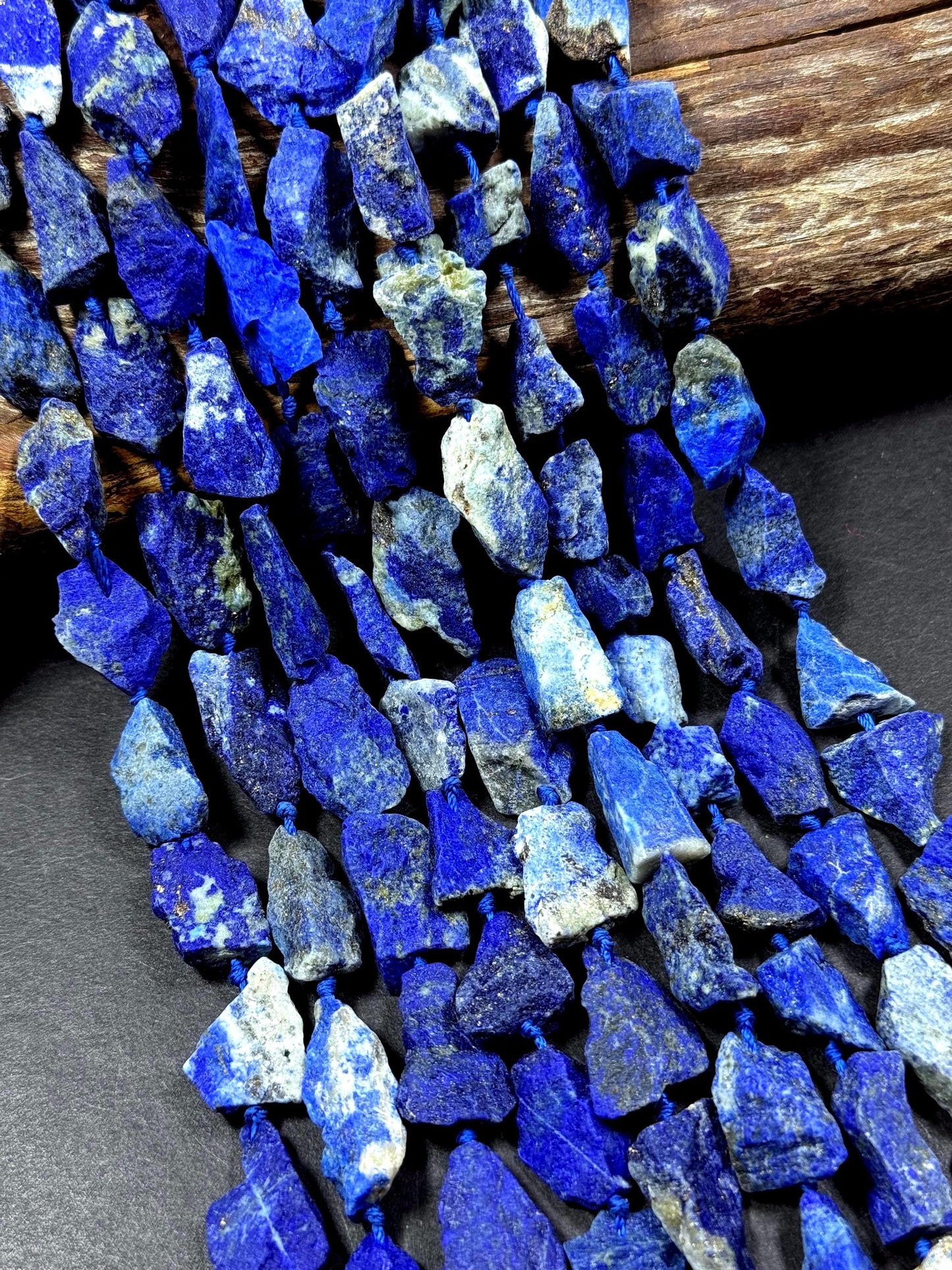 Natural raw lapis gemstone bead. freedom nugget shape . gorgeous Natural royal blue color . Not treated. excellent quality. full strand 15.5
