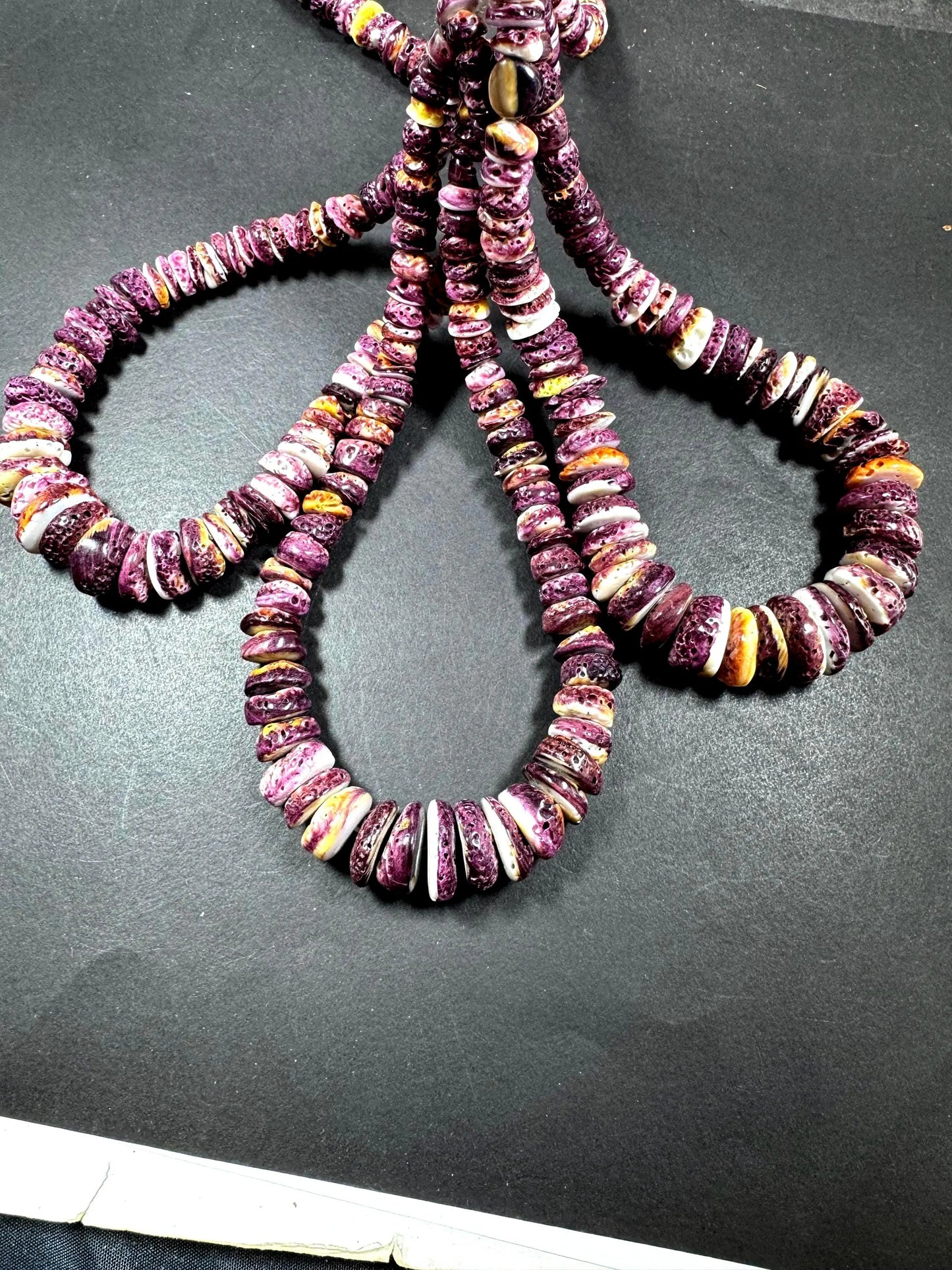 AAA natural spiny oyster shell bead . great quality . beautiful natural dark purple color. not treated .excellent quality spiny shell beads