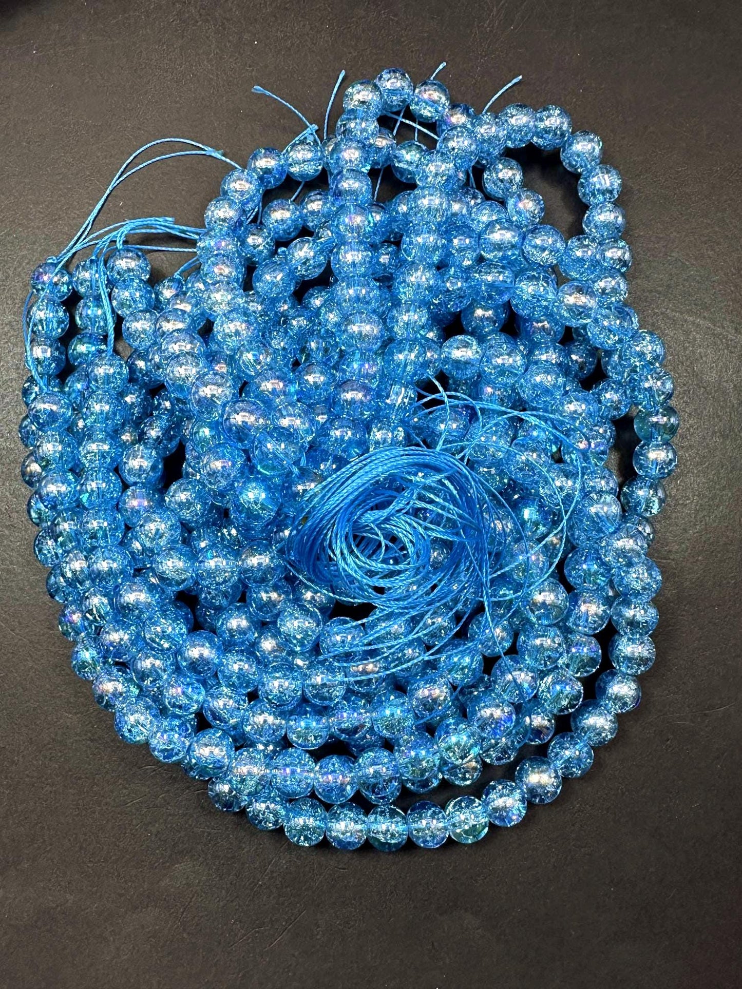 Light Blue Crystal Glass Smooth Bead with Rainbow Flash. High quality crystal bead! Full strand 15.5