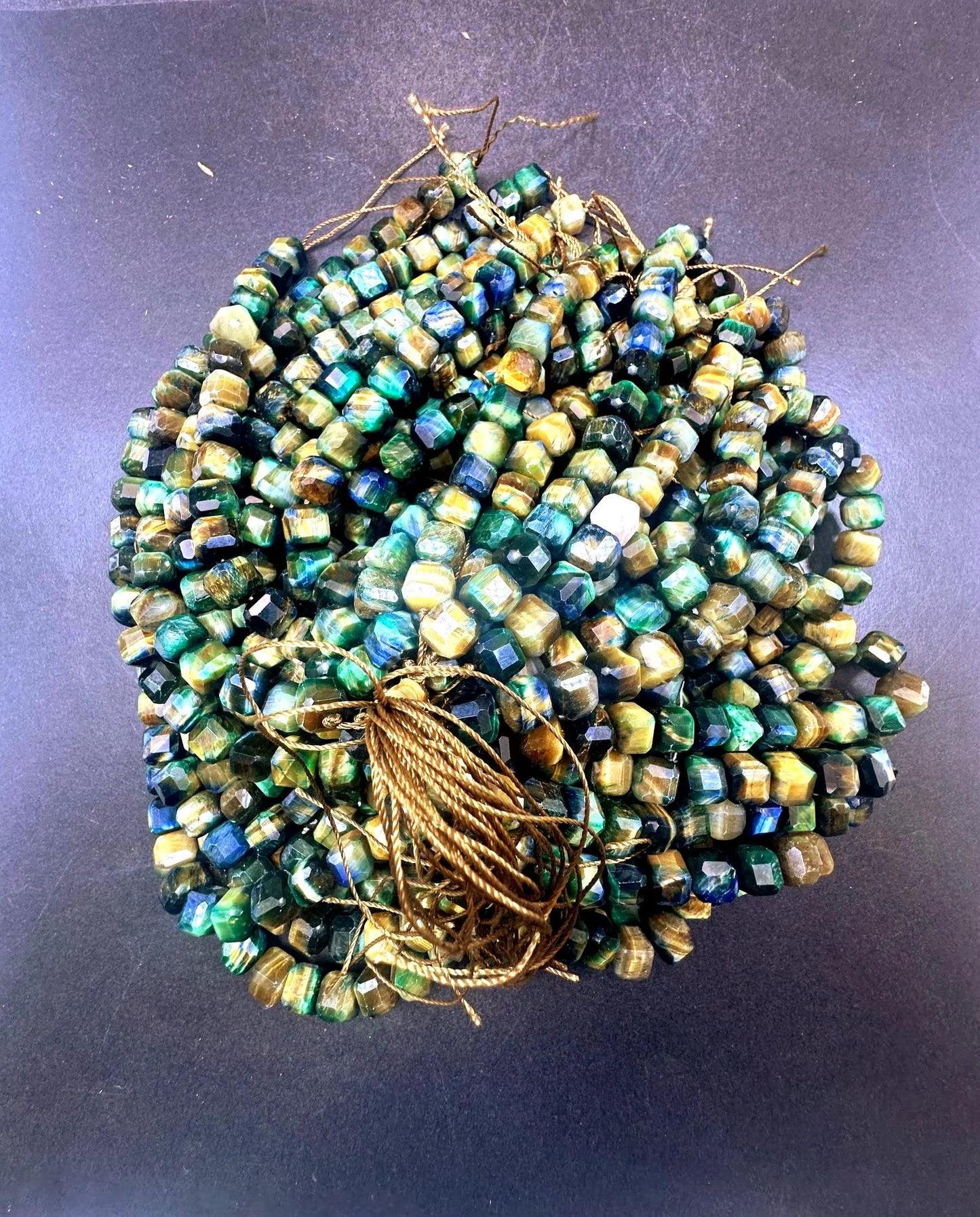 Galaxy tiger eye stone bead. Faceted 8mm cube shape bead . Gorgeous green multi color tiger eye gemstone .Unique looking tiger eye bead