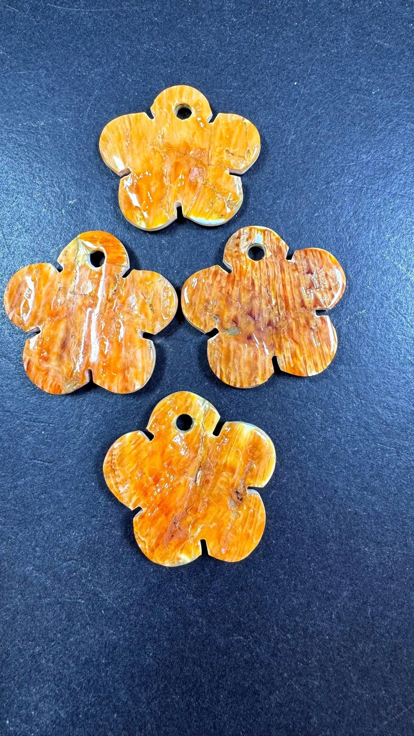 Natural spiny oyster shell pendant . Flower shape . Gorgeous Natural spiny oyster shell pendants . Natural orange yellow color . Not treated