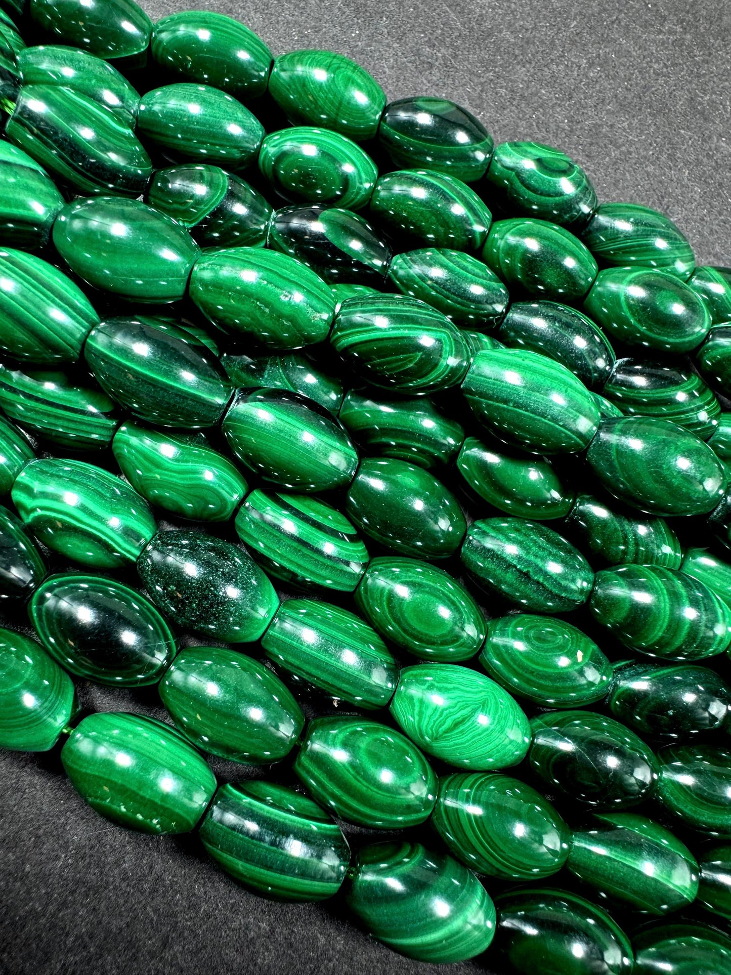 AAA Natural Malachite gemstone bead. Barrel shape. Beautiful Natural Green color. Great quality. Full strand 15.5"