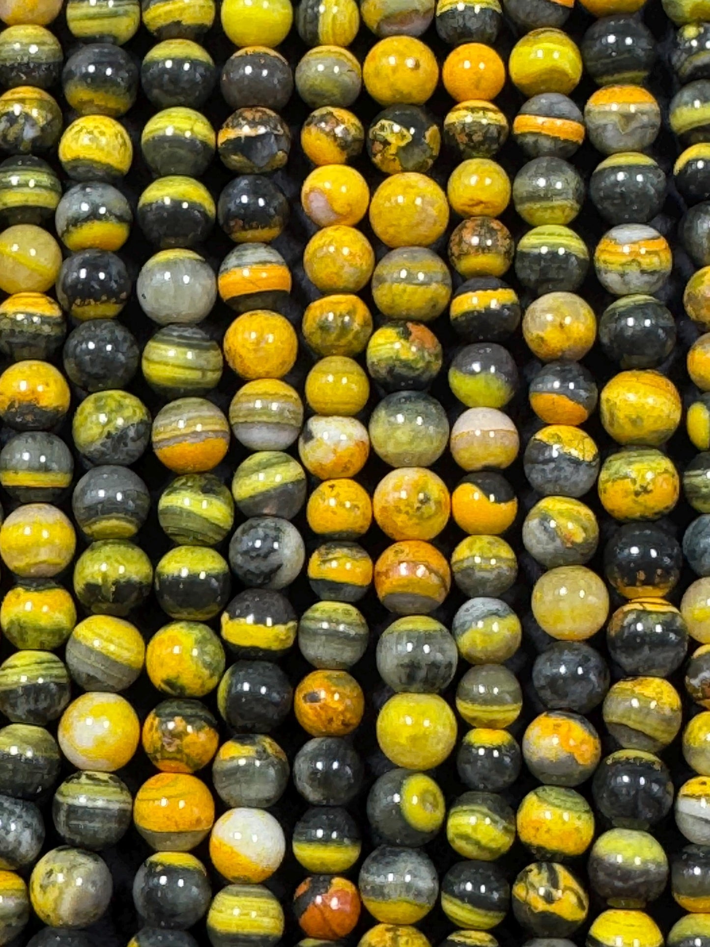 Natural yellow Jasper gemstone bead. smooth round shape . gorgeous natural yellow black color Jesper bead. excellent quality.full strand 15.