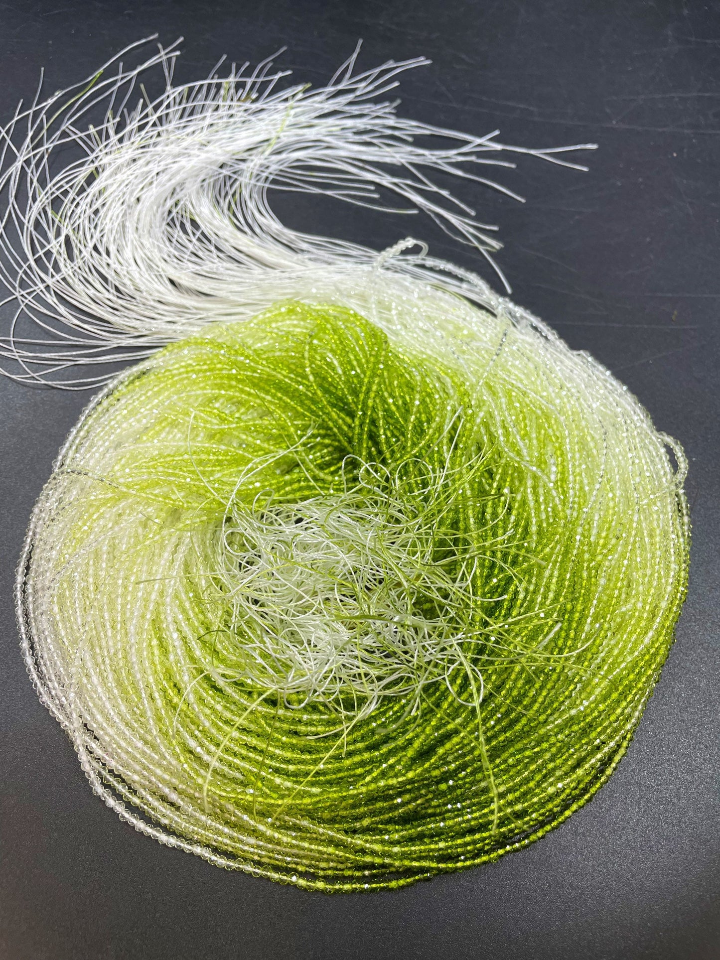 Beautiful green rainbow multi color crystal beads . Faceted 2mm round beads . Gorgeous green white color crystal bead . Full strand 14.5”